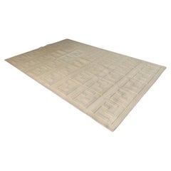 Tapis carré Casa « Motif » de Fendi, en laine ivoire