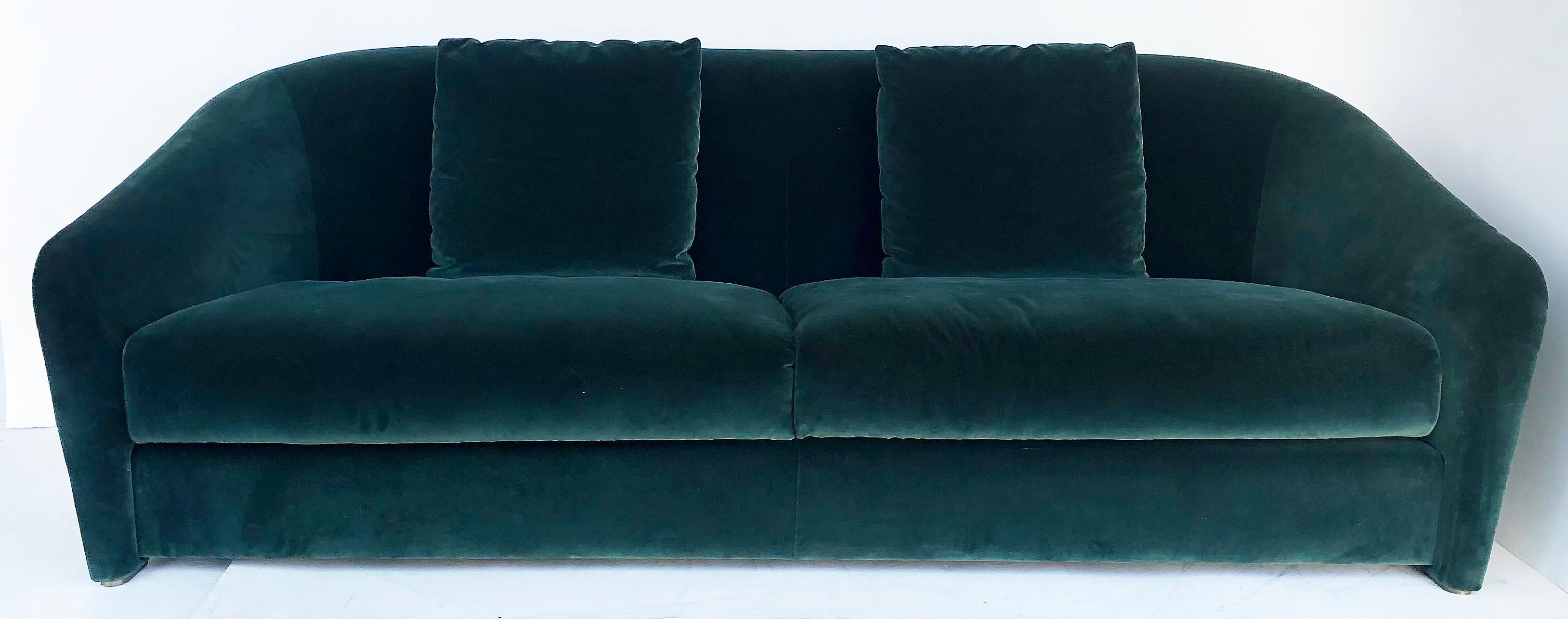 Fendi Casa over scale emerald green silk velvet sofa

Offered for sale is a Fendi Casa over scale, emerald green upholstered silk velvet sofa with two loose seat cushions. The sofa has a tall upholstered back and two loose cushions. The poly/down