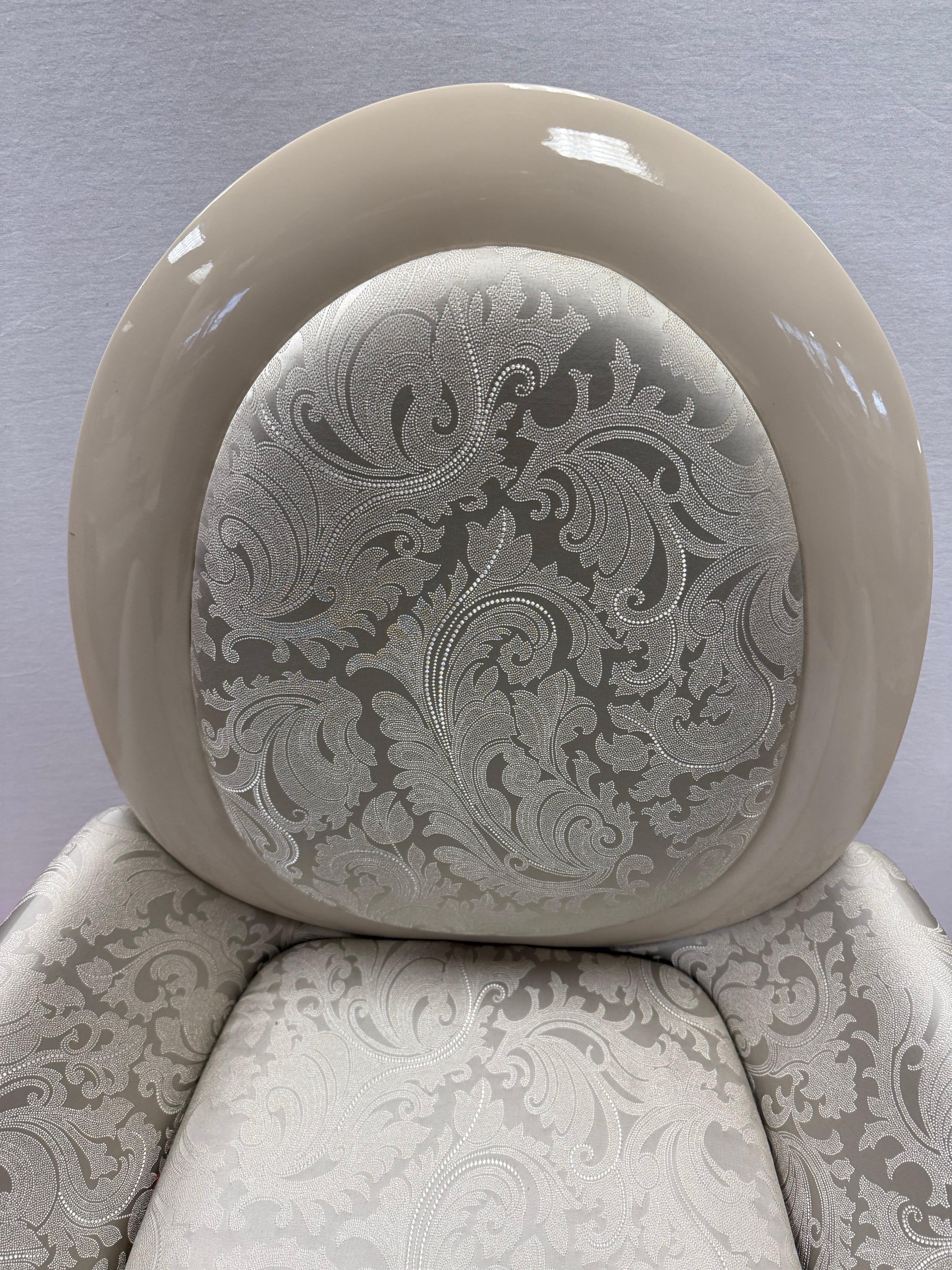 Stunning, signed Fendi Casa ivory lacquered arm chair in perfect, like new condition. Great lines and better scale. We may be able to help with s/h, just reach out. Why not own the best?