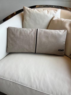 Fendi Casa taupe suede kidney pillow with perferated Fendi bask and chocolate