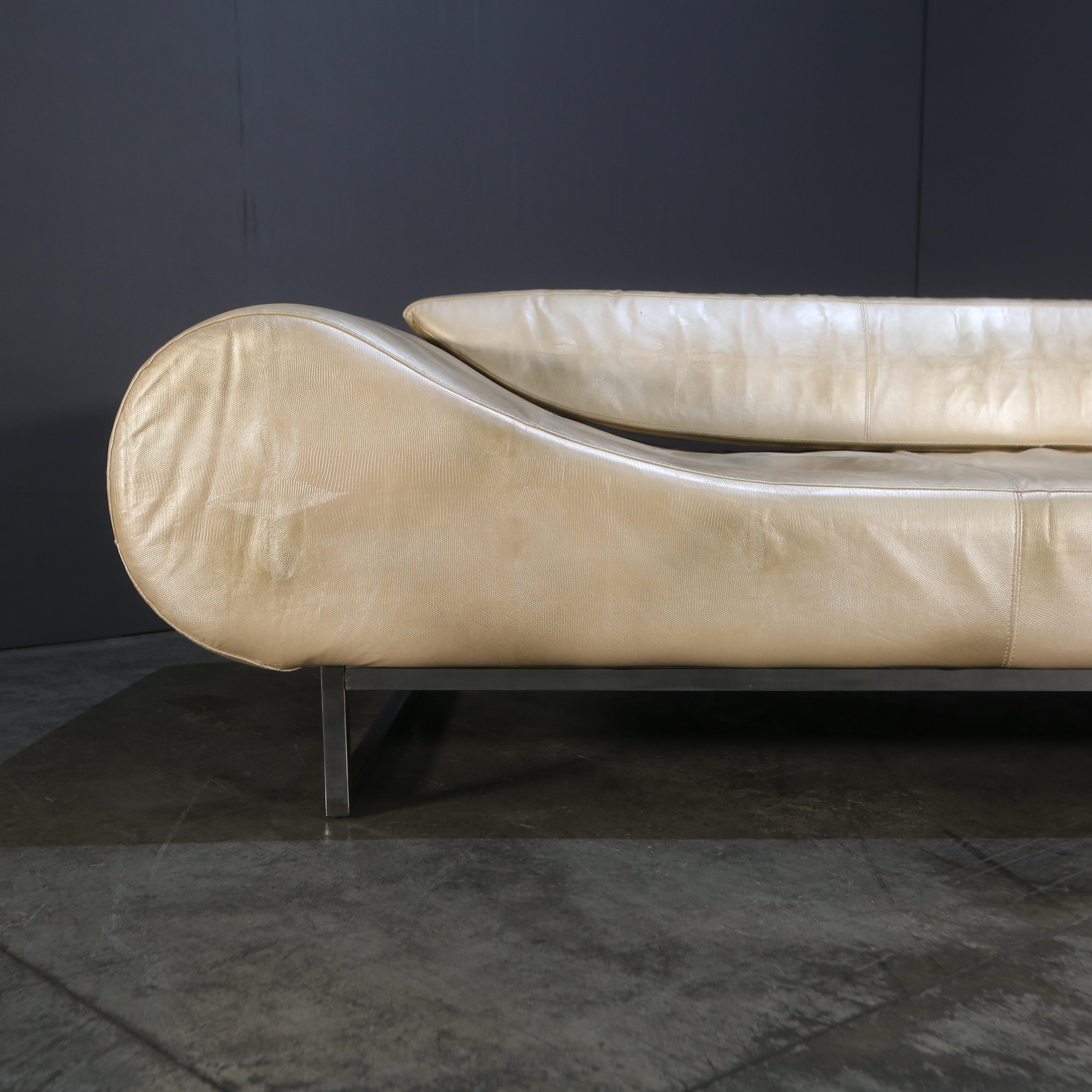 The Fendi Casa White Leather Eros Sofa exudes contemporary elegance and luxurious comfort, embodying the impeccable craftsmanship for which Fendi is renowned. Its fluid, curvaceous design is both minimalist and bold, seamlessly integrating into