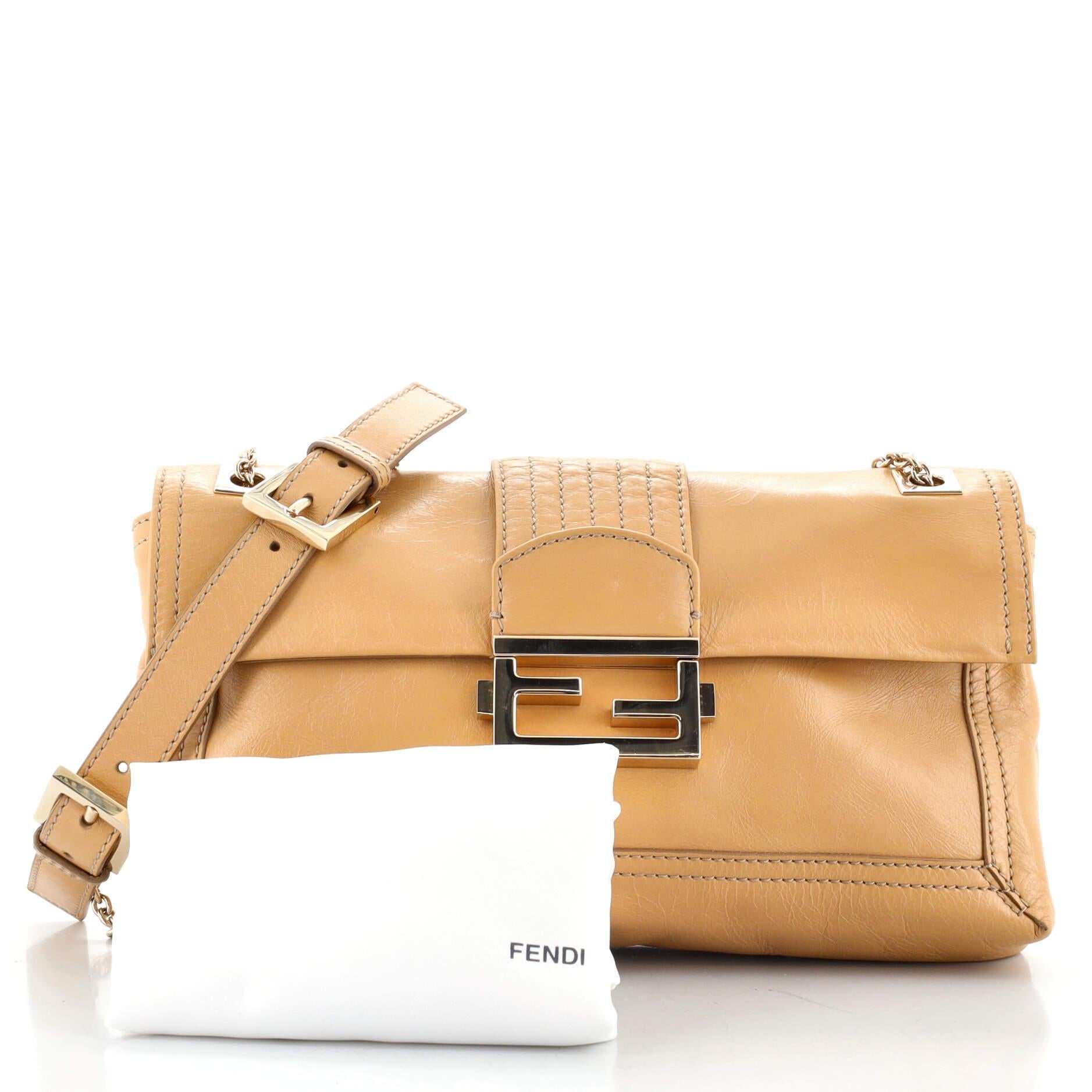 Condition: Good. Creasing on exterior, minor wear on base corners and opening edges, small glue stains on side flap edges, wear and creasing on shoulder pad. Small indentation on flap trim, slight splitting on flap wax edges, cracking on shoulder