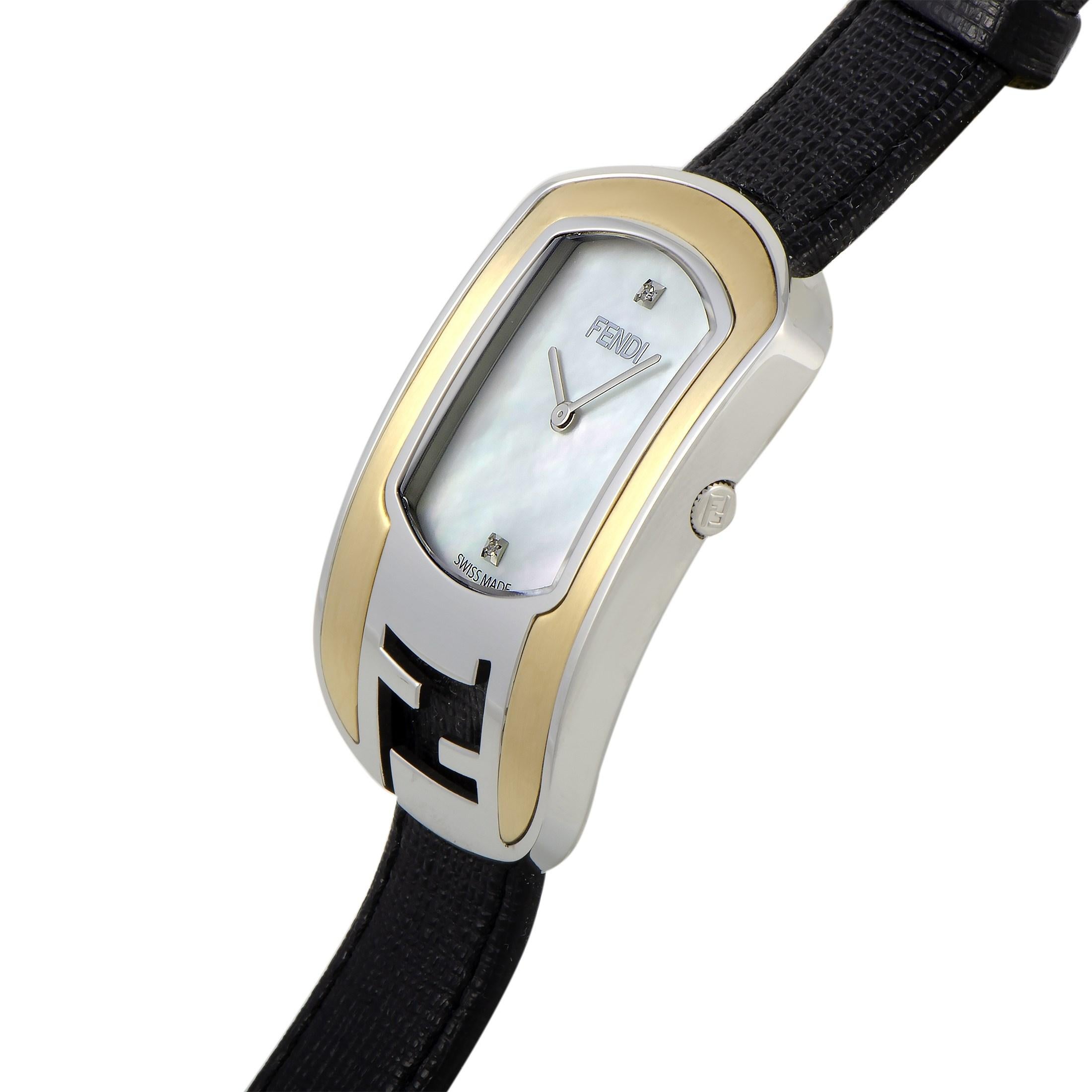 This is the Fendi Chameleon watch, reference number F303134511D1.

It is presented with a two-tone stainless steel case that offers water resistance of 30 meters. The watch is worn on a black leather strap fitted with a tang buckle. The mother of
