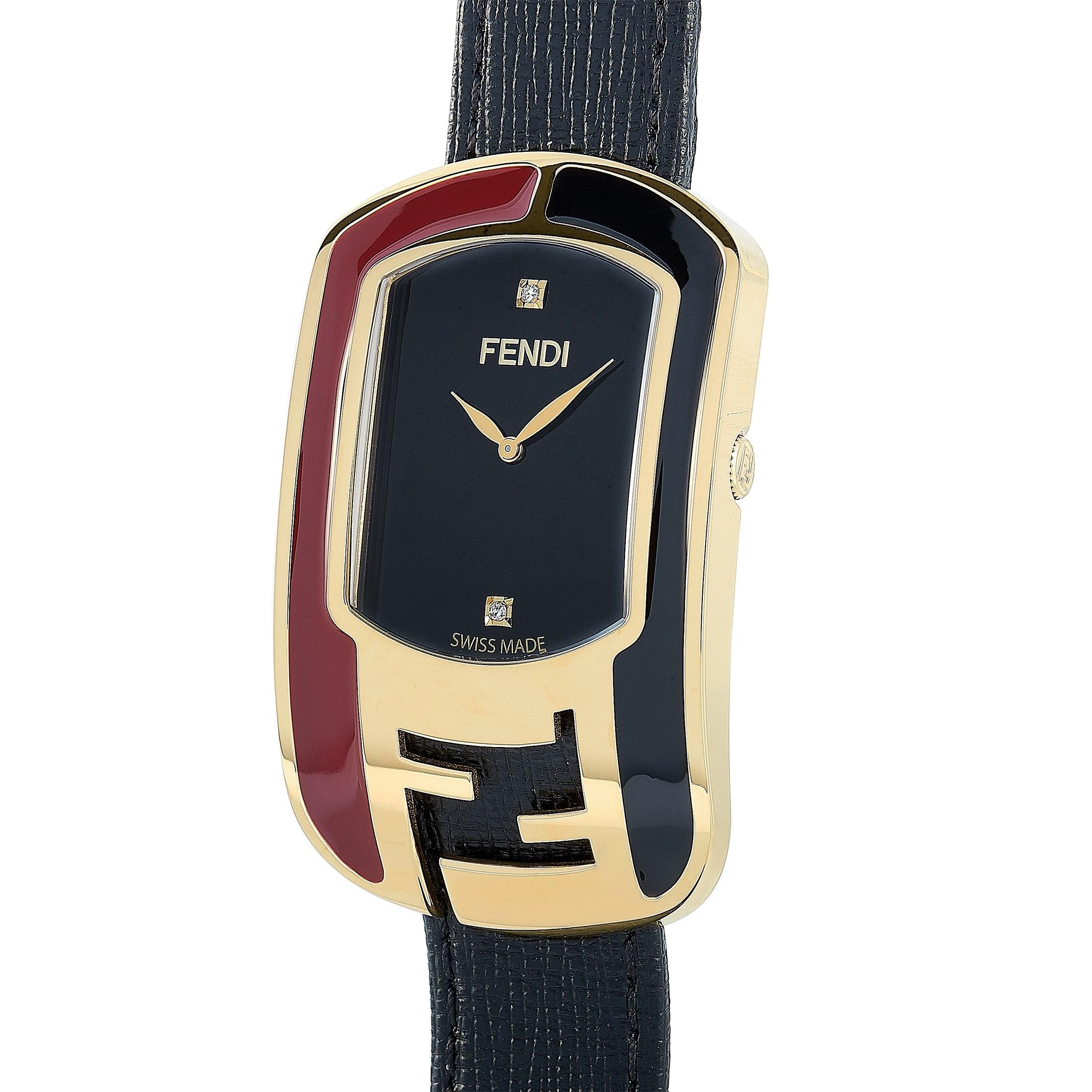 The Fendi Chameleon watch, reference number F322431011D1, boasts a gold-tone stainless steel case that is presented on a black leather strap, secured on the wrist with a tang buckle. This model is powered by a quartz movement and indicates hours and