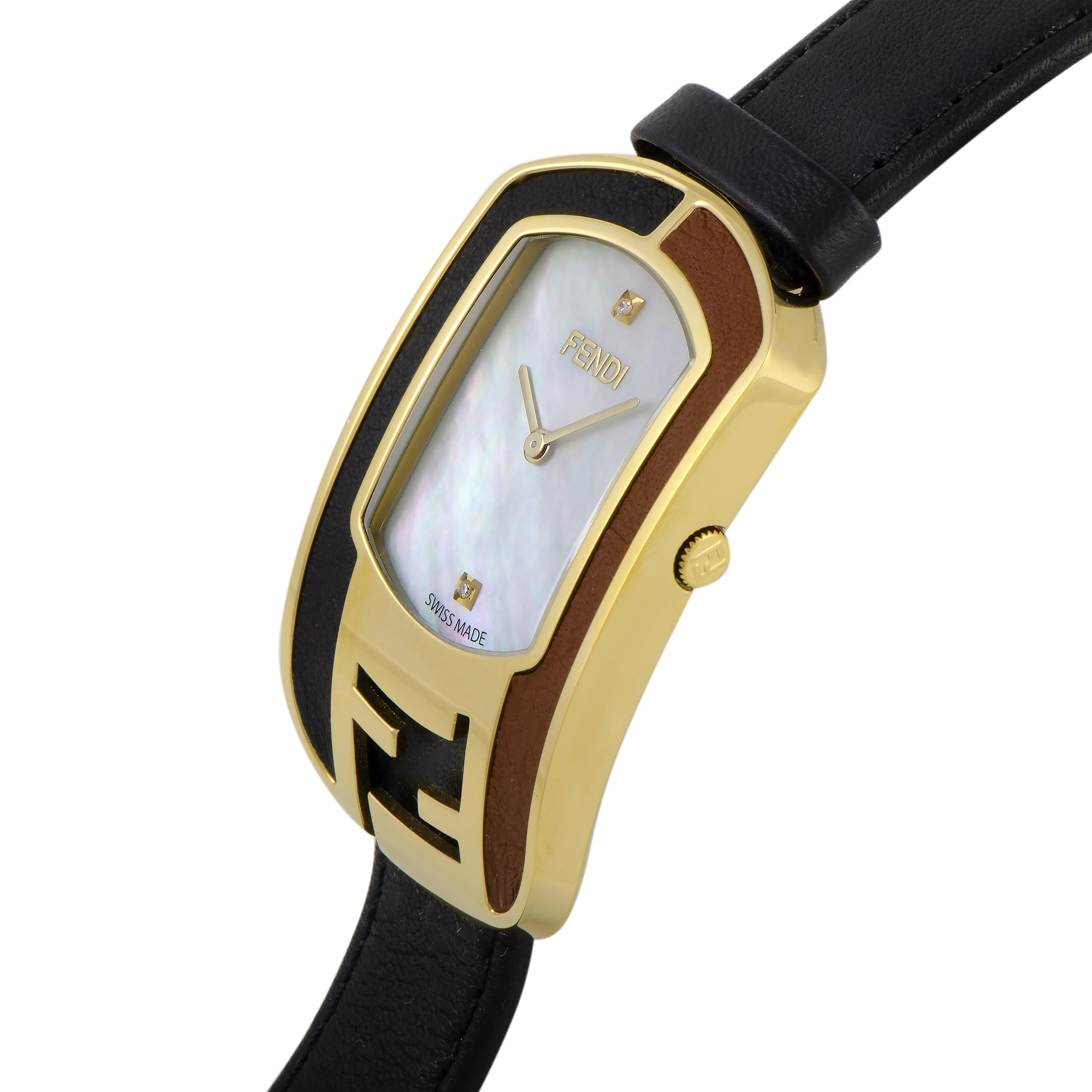 This is the Fendi Chameleon watch, reference number F331434511D1.

It is presented with a gold-tone stainless steel case that offers water resistance of 30 meters. The watch is worn on a black leather strap fitted with a tang buckle. The mother of