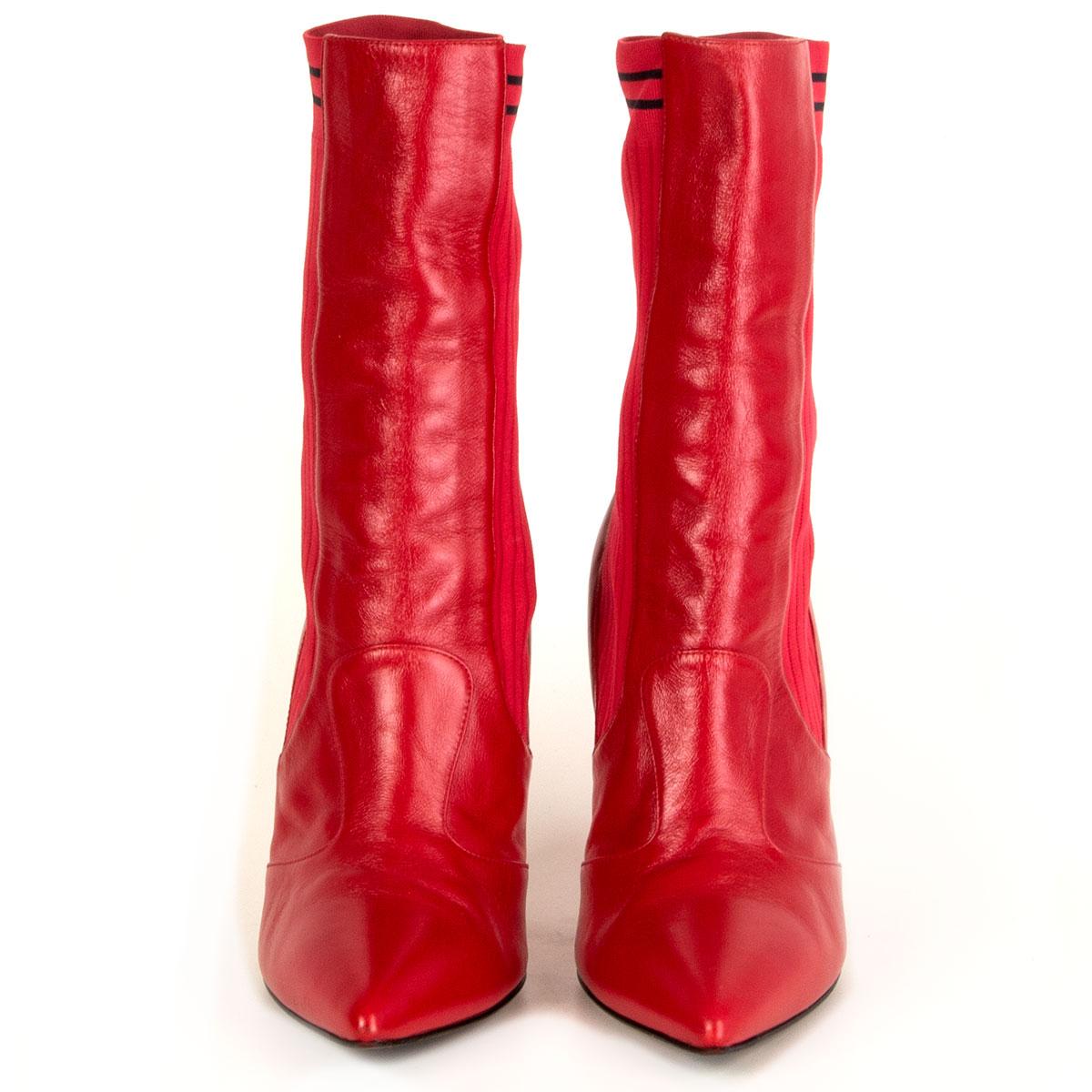 100% authentic Fendi Sock ankle-boots in cherry red calfskin with stretch fabric inserts. The tapered shape is infused with sporty details. The heel has a slender geometric shape. Have been worn and are in excellent condition.