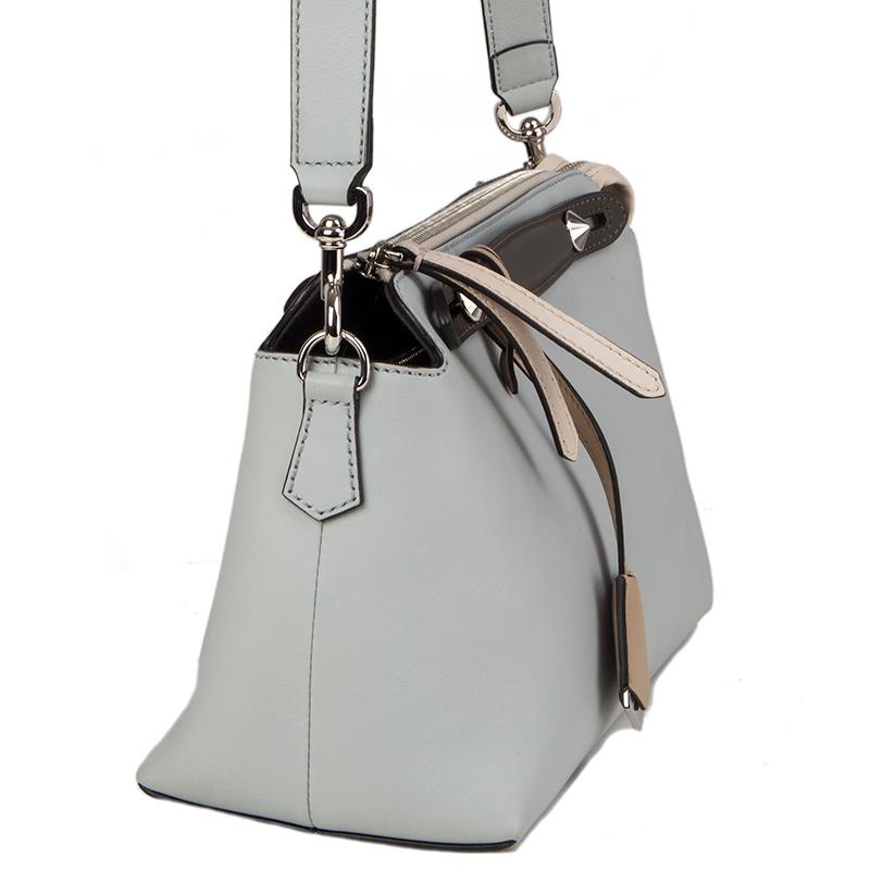 Fendi 'By The Way Regular' Boston bag in light blue (cloud) calfskin featuring off-white trimmings and anthrazite handles. Opens with a zip fastening and is lined in black canvas. Interior with double pocket, divided into two compartments by a