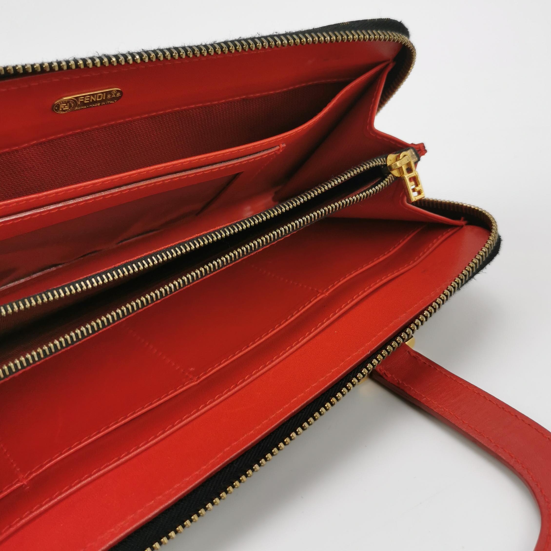 Donna Pochette Fendi in denim con stampa leopardo e manici in pelle rossa