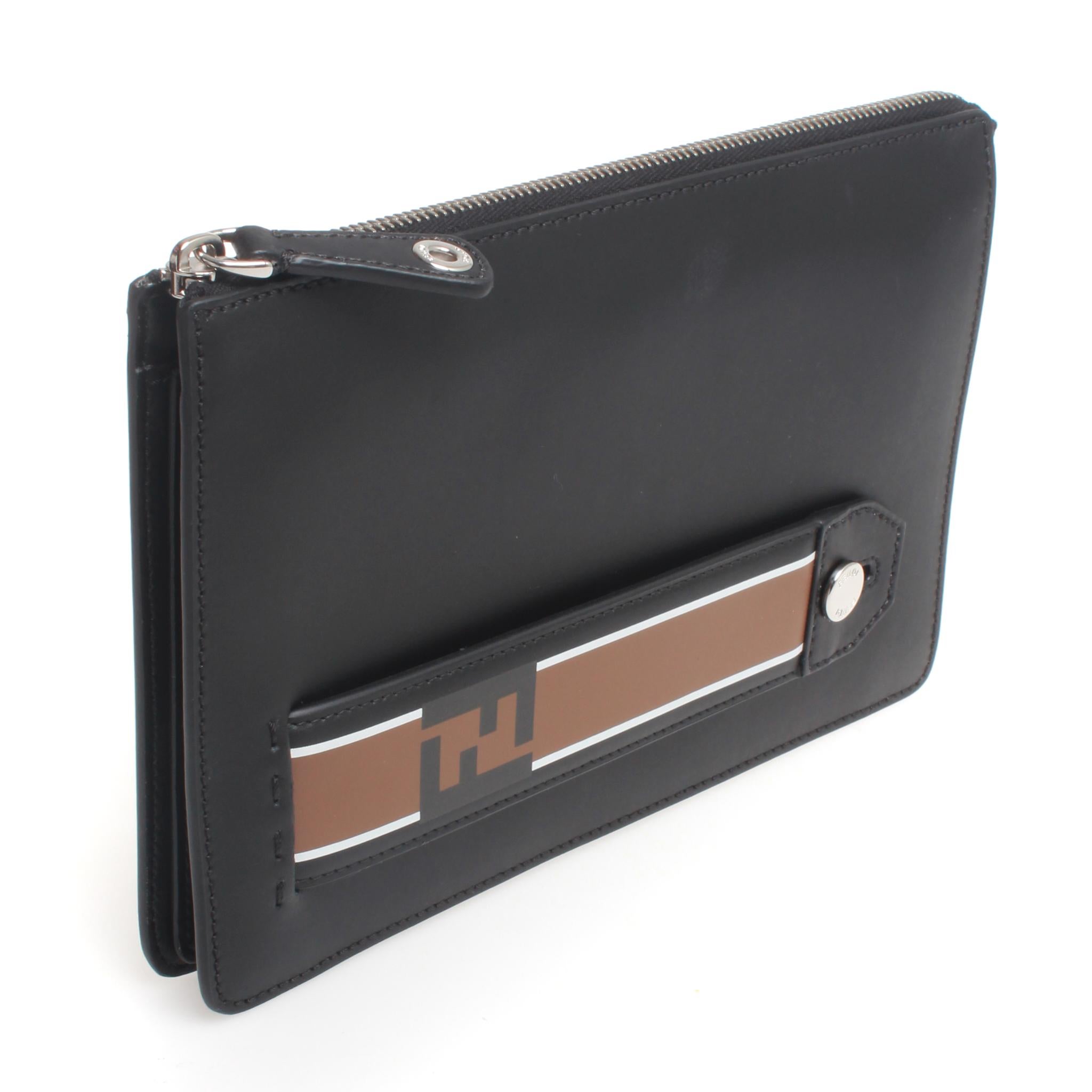Sleek and minimal FENDI black and brown leather envelope clutch.