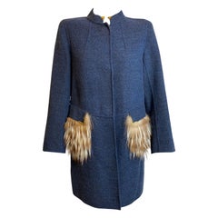 Fendi coat in 100% wool in a melange blue with fur details on the pocket