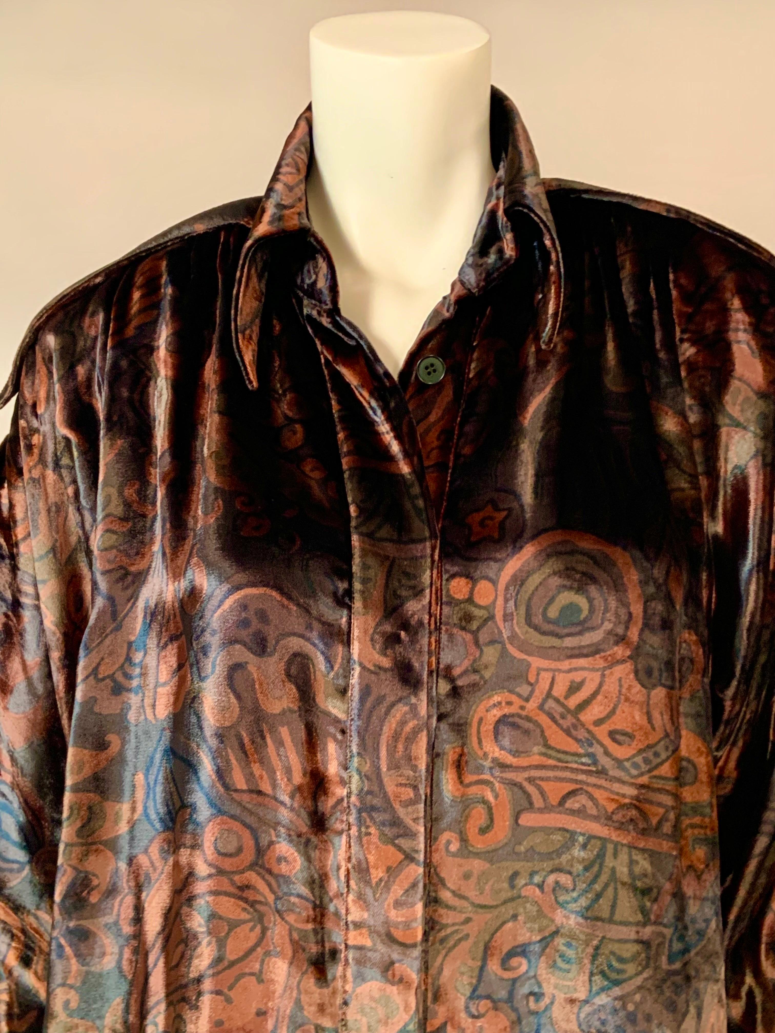 This printed panne velvet blouse from Fendi is copper and charcoal with a lot of interesting design features.  The shoulders have epaulets, the front is gathered at the shoulder seam, the sleeves are cut very full, and the back has a V shaped panel