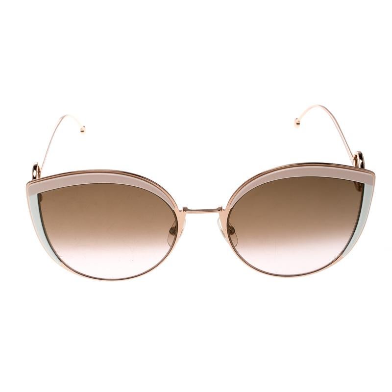 This pair of sunglasses from Fendi is in tune with the high-end, effortless style the brand is known for. The gradient lenses that are made in Italy come enclosed in cat-eye frames held by slim temples detailed with the brand's F logo.

Includes: