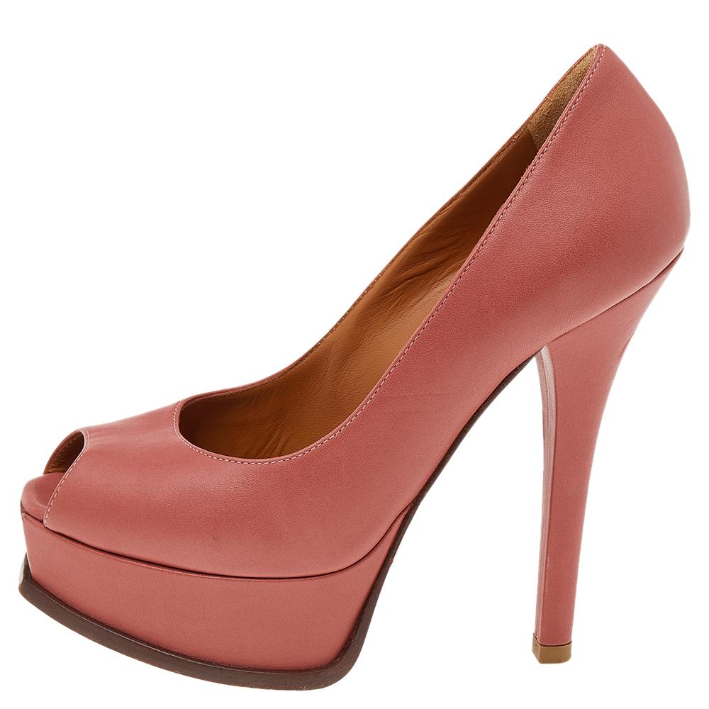 The iconic Fendista pumps will never go out of style, combining classic with modern. Crafted in leather, this Fendi pair is designed with peep toes and self-covered platforms, and high heels. They feature a Zucca monogram insert at the toe fronts.
