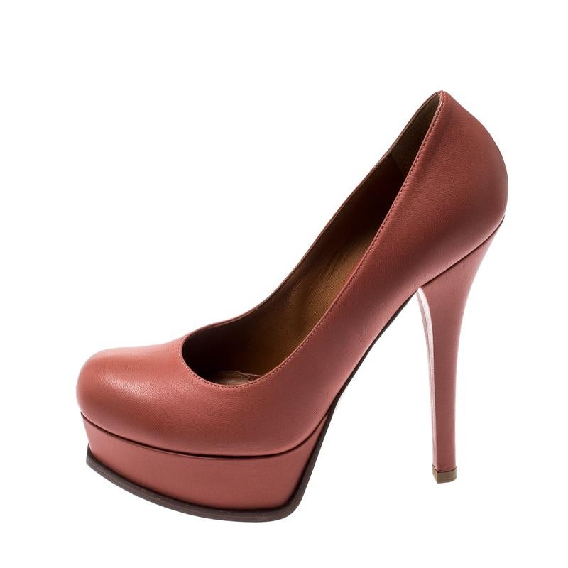 Combining classic with modern, these Fendista pumps will never go out of style. Crafted in coral pink leather, this Fendi pair is designed with 14 cm heels and the logo on the platforms. Stand out with this fabulous pair!

Includes:Original Dustbag
