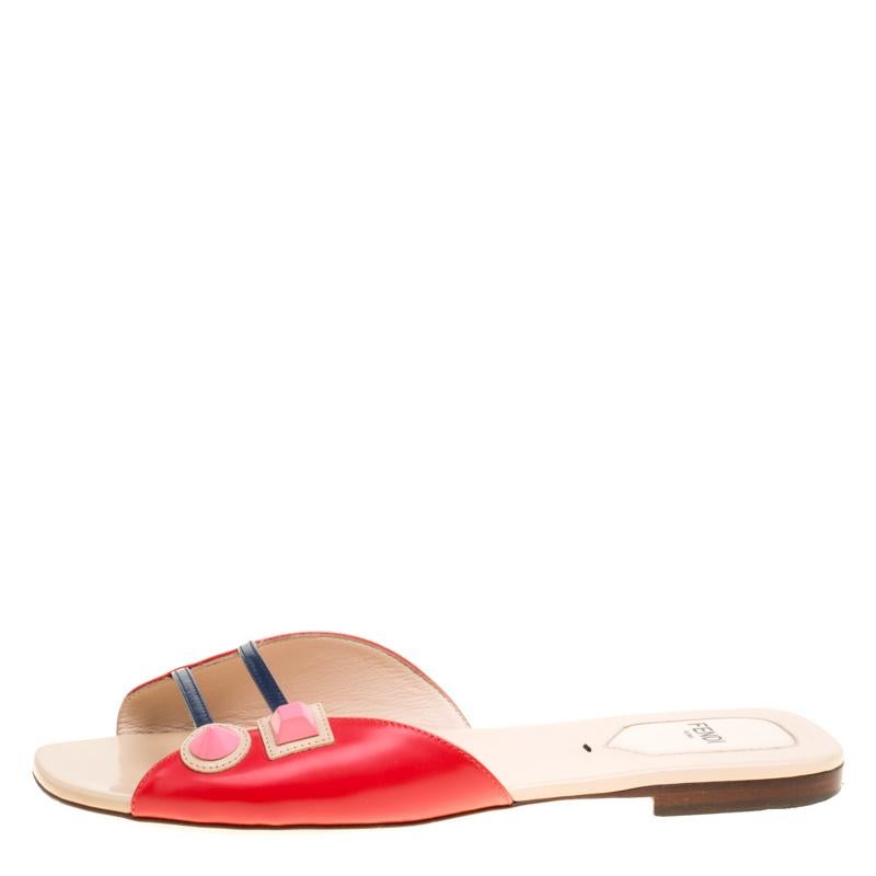 These slides from Fendi are trendy and easy to slip on. They've been designed with leather and studs in a slip-on style and the insoles are lined to offer comfort. This is one pair that speaks fashion in a simple way.

Includes: Original Dustbag