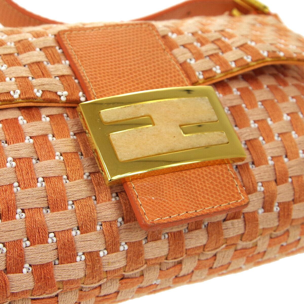 
Woven
Lizard leather
Bead
Gold tone hardware
Buckle closure
Satin lining
Made in Italy
Adjustable strap drop 4-7