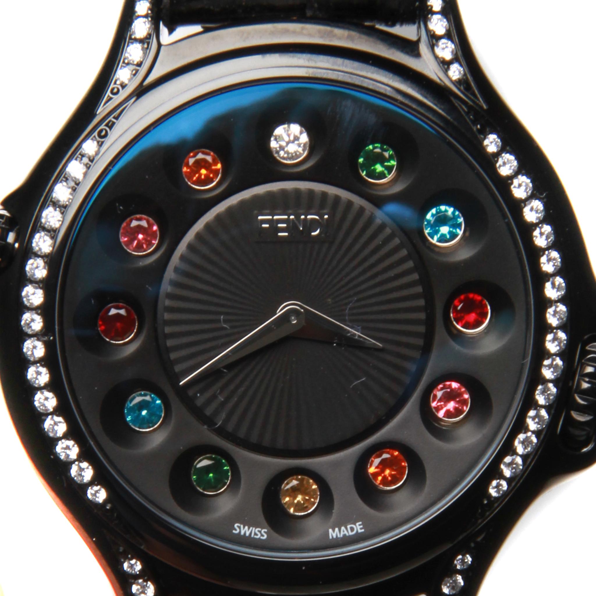 Crazy Carats Python strap watch with diamond bezel 

Fendi timepiece from the Fendi Crazy Carats collection, precious stones are revelled when you twist the crown these include 11 rainbow topaz, 11 pink topaz, 11 white topaz and a single stationary
