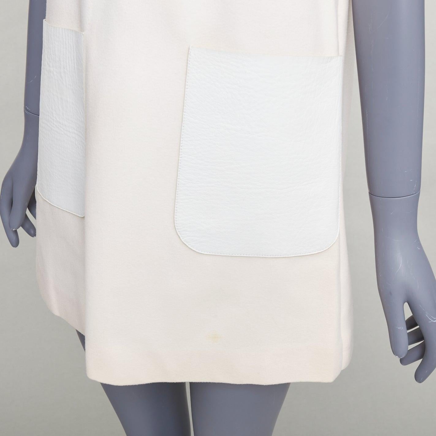 FENDI Creme 100% Wolle Leder aufgesetzte Tasche Seide gefüttert Minikleid IT36 XXS
Referenz: YIKK/A00216
Marke: Fendi
MATERIAL: Wolle, Leder
Farbe: Creme, Weiß
Muster: Solide
Verschluss: Reißverschluss
Innenfutter: Cremefarbene Seide
Hergestellt in: