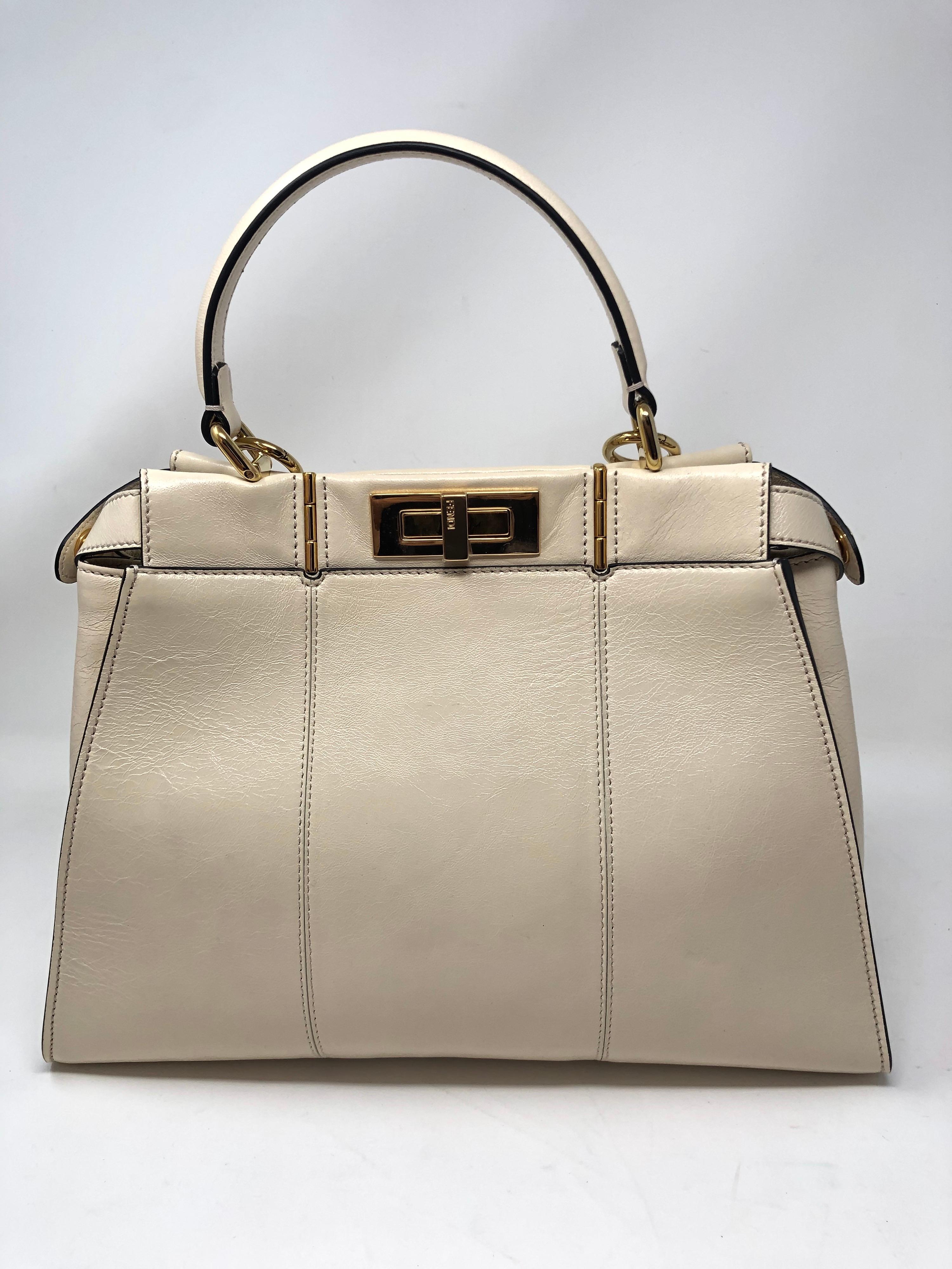 Fendi Cream Peekaboo Bag. Brand new and never used. Retail over $6,000. Can be worn 2 ways. Beautiful bag with lots of details. Guaranteed authentic. 