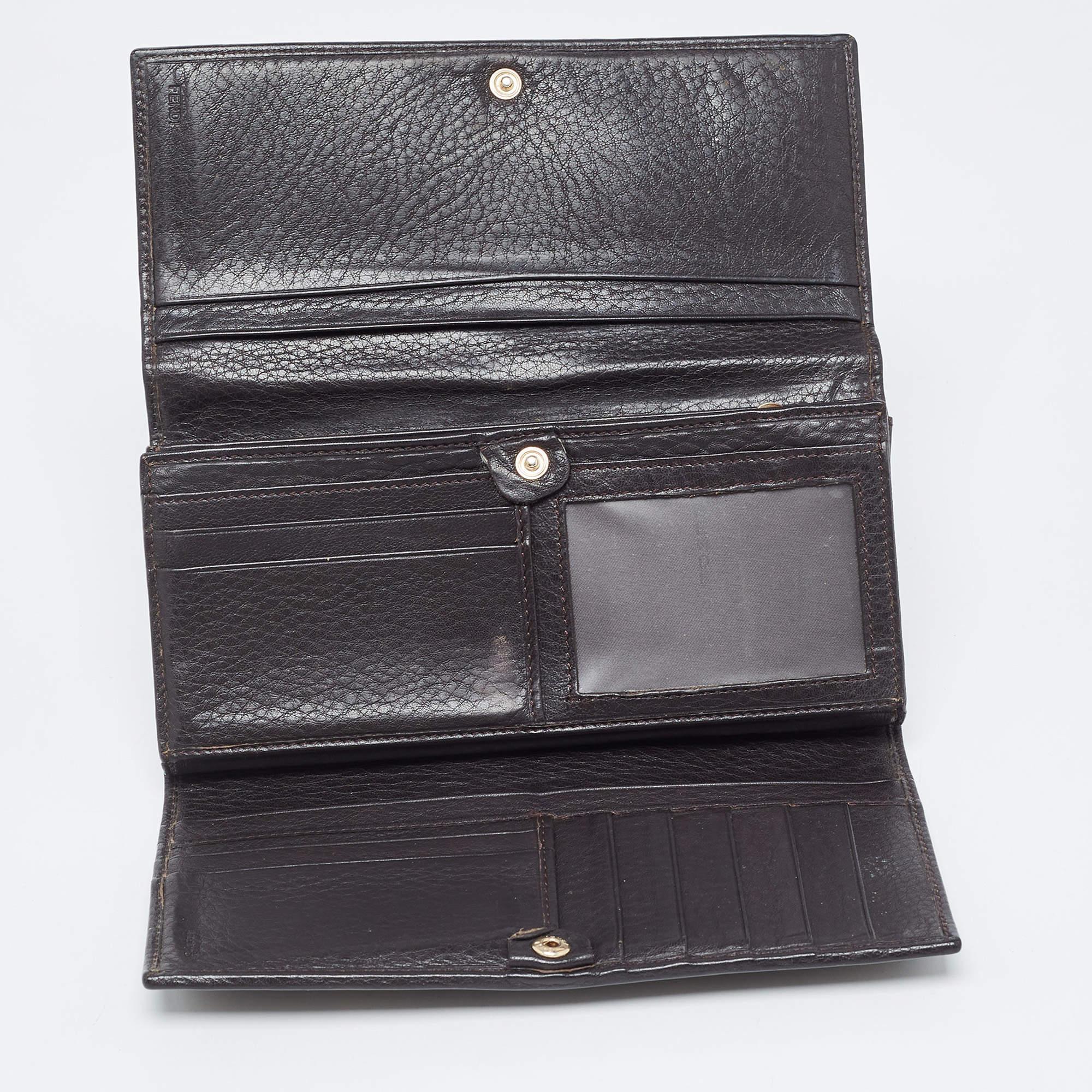 A beautiful wallet for stylish women, this Fendi wallet is perfect to be carried solo or inside your tote while you step out to run errands. It is a durable accessory.