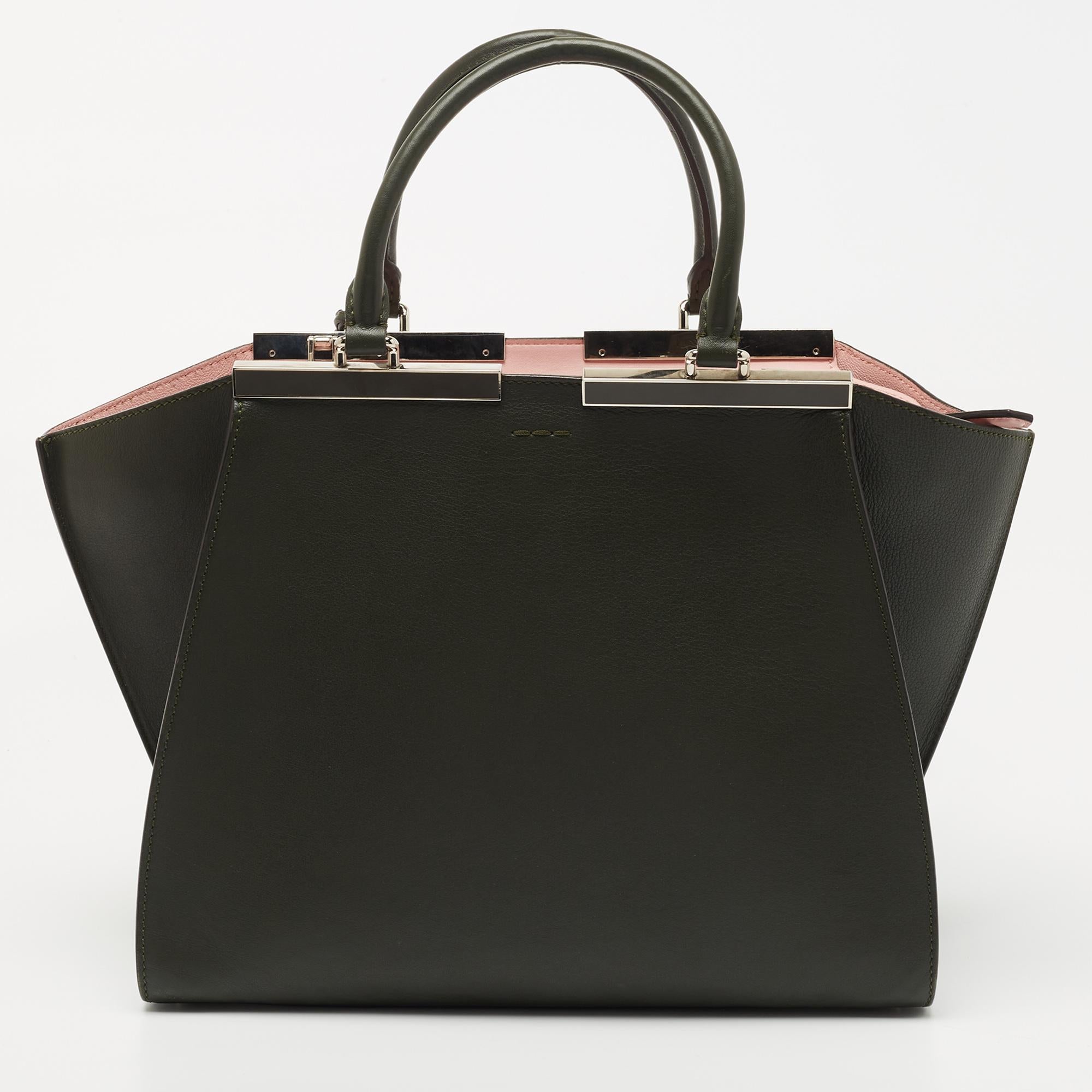 Fendi's 3Jours tote is one of the most iconic designs from the label, and it still continues to receive the love of women around the world. Crafted from leather, this tote features double handles, a shoulder strap, and a brand signature on the top