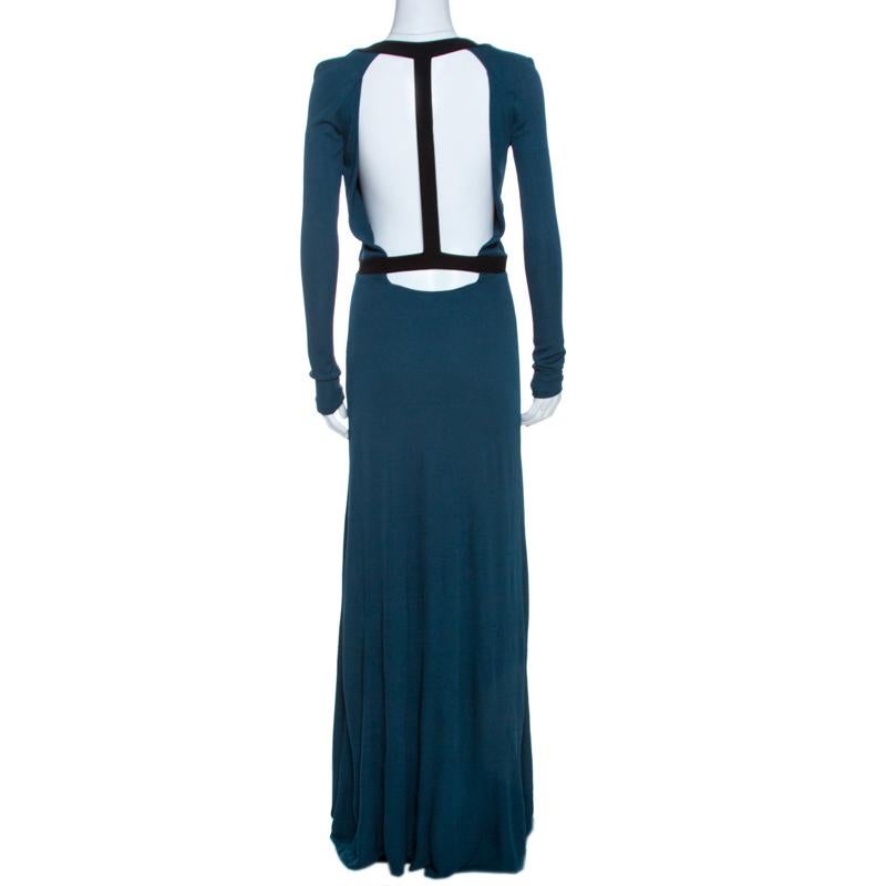This flattering Fendi dress will make a great fashion statement and will make sure that you are the centre of attention everywhere you go. Crafted from quality materials, this maxi dress comes in a lovely shade of dark teal. The dress is styled with
