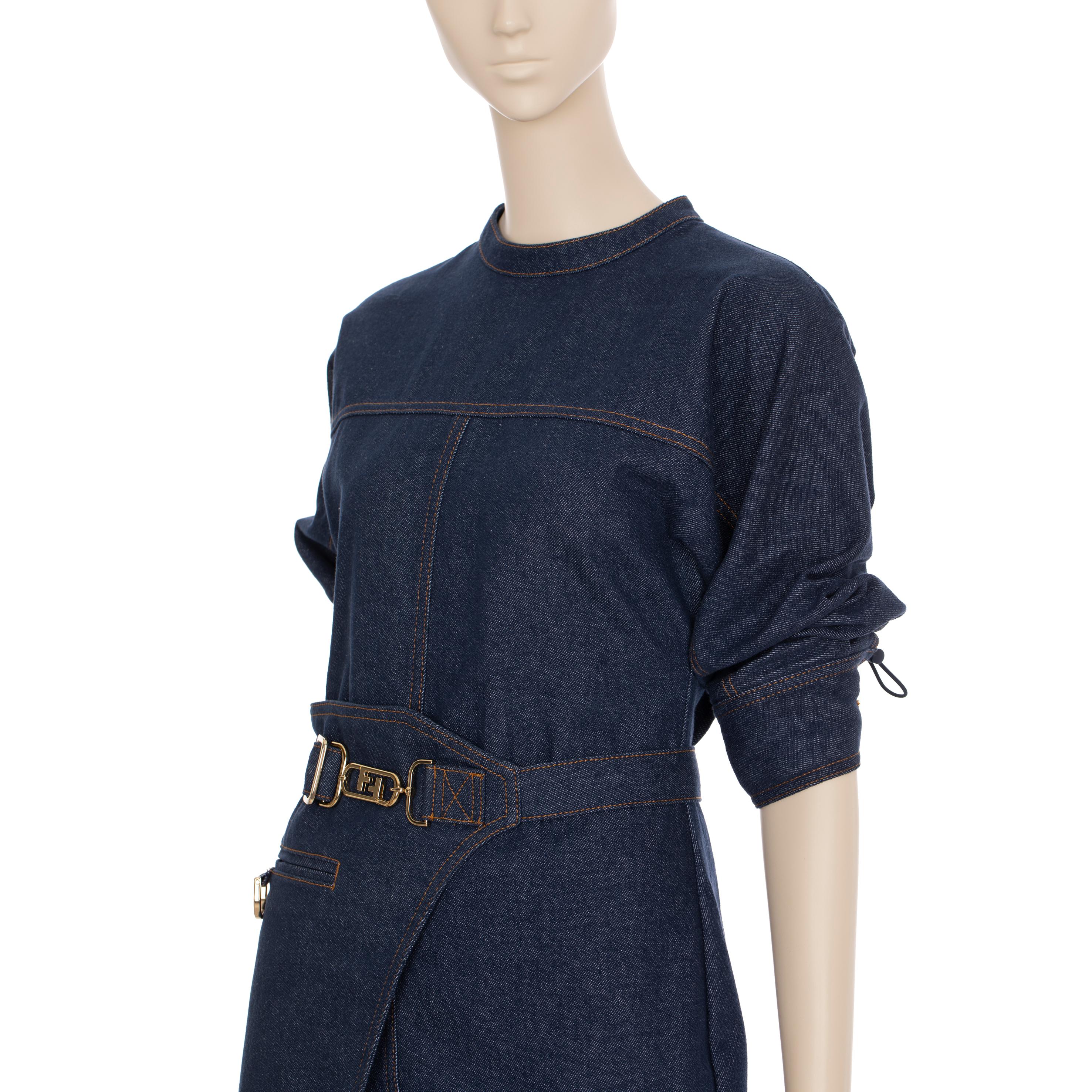This Fendi denim dress is the perfect combination of bold sophistication and functional style. Boasting a side belt bag and gold-tone hardware.

Brand: Fendi

Product: Denim Dress With Belt Bag

Size: 36 IT

Colour: Denim Blue

Material: 100%