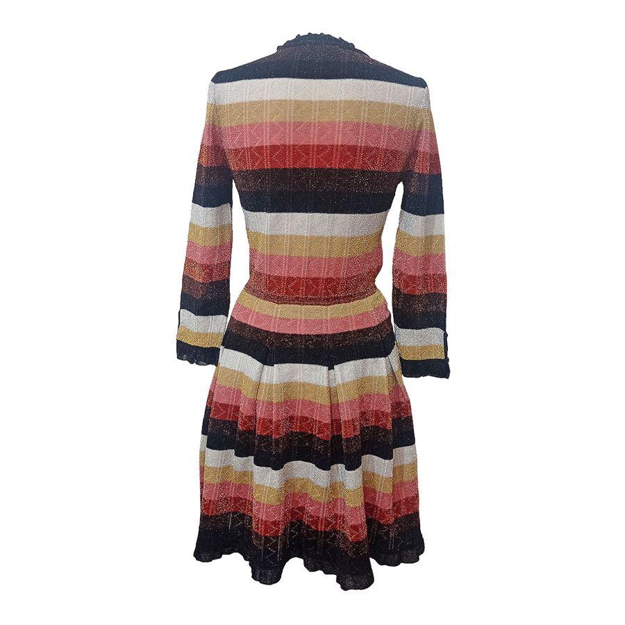 Wool (65%) Polyester (22%) Poliamid (13%) Multicolor stripes Long sleeves Round neck Mink fur application Total length cm 92 (36,22 inches) Shoulders cm 34 (13,38 inches)
