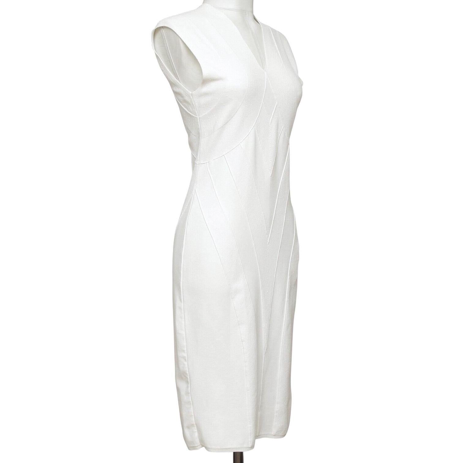 GUARANTEED AUTHENTIC FENDI WHITE VISCOSE KNIT SLEEVELESS DRESS

Design:
- White viscose knit patterned sleeveless dress.
- V-neck.
- Sleeveless.
- Slip-on.

Material: 83% Viscose, 17% Polyester

Size: 40

Measurements (Approximate Laid Flat, Good