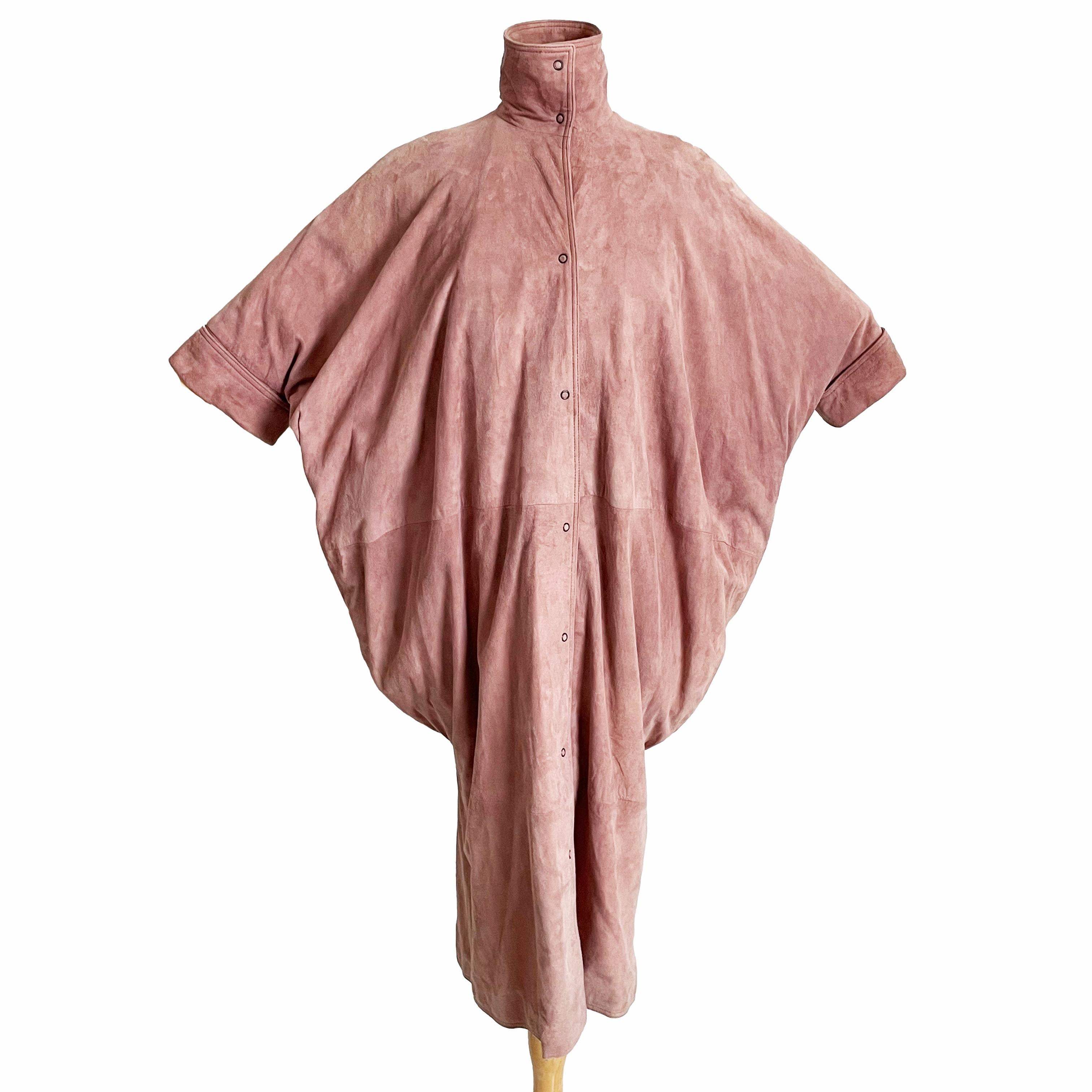 Authentic, preowned, vintage Fendi batwing duster jacket, likely designed by Karl Lagerfeld in the 1980s.  Note that we've included a sketch by Karl Lagerfeld (see last image), who worked for Fendi for some 50+ years between the 60s and 90s, and