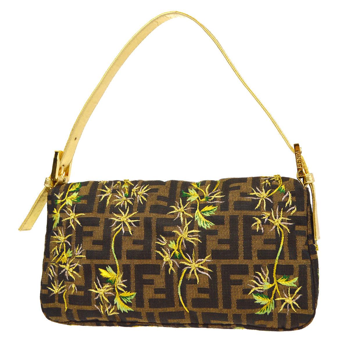 Fendi Embroidered Zucca Baguette Handbag Brown Gold

Additional information:
Material: Canvas, Leather
Color: Brown, Black, Gold, etc.
Pocket: Inside: Zipper Pocket*1
Size(Inch): W 10.2 x H 5.5 x D 1.6