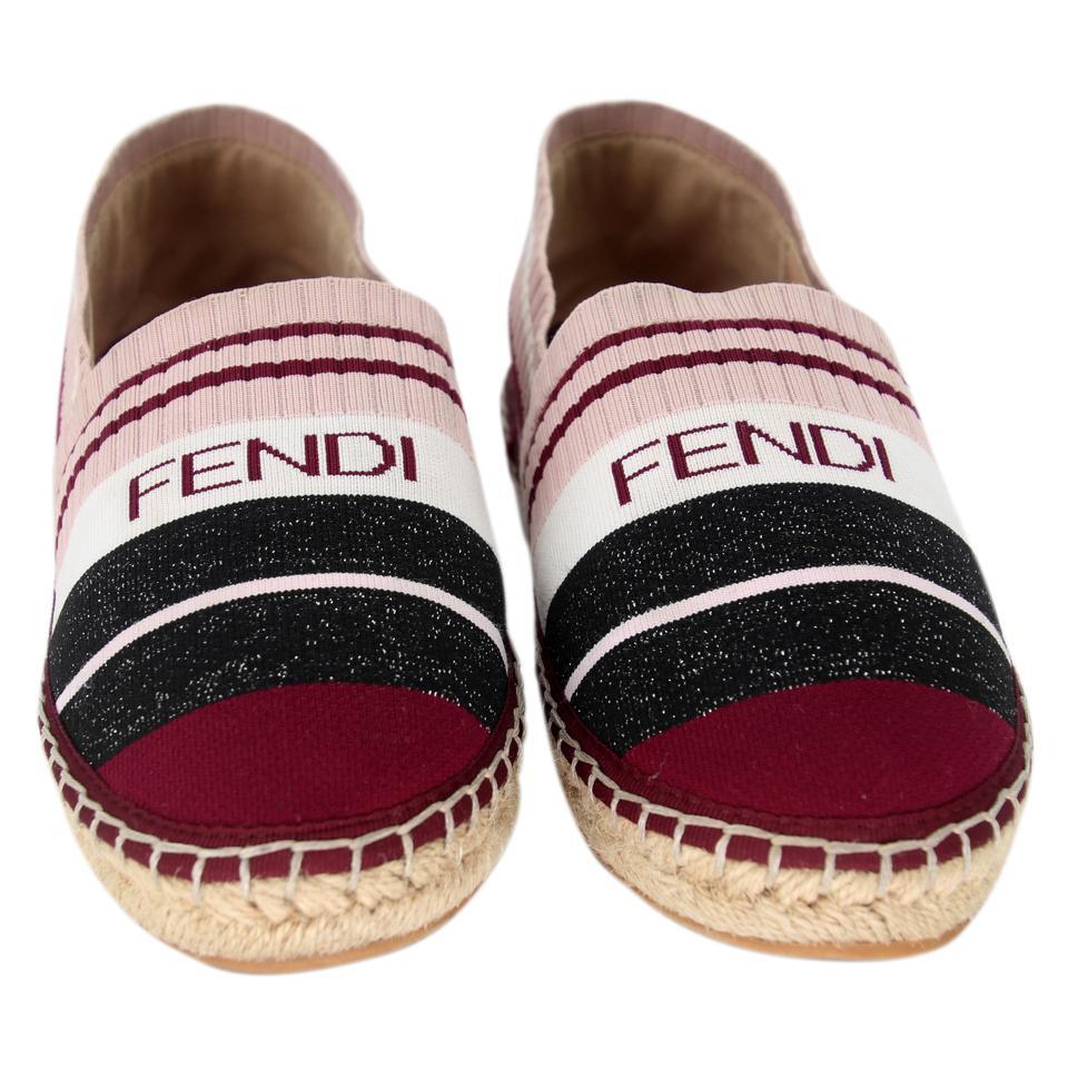Fendi Espadrille 38 Stripe Knit Fabric Logo Flats FF-0502N-0139

These espadrille flats are so chic and fun! Featuring knit fabric with multicolor stripes and a logo on the vamps. Casual espadrille soles are always a hit in the warmer months. You'll