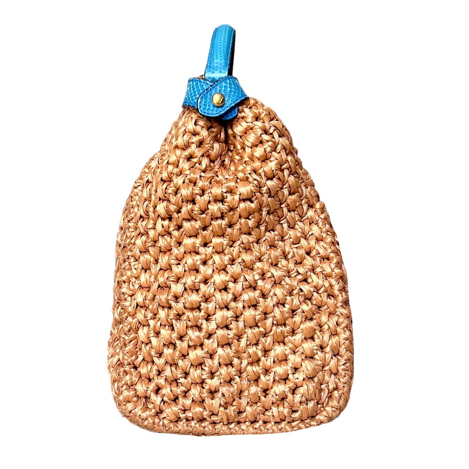 Rare FENDI Peekaboo XL shoulder bag 
Limited Edition

Details: 

• FENDI Exotic Peekaboo Bag
• Limited Edition
• Made of handwoven natural honey-colored raffia
• Exotic blue snakeskin trimmings 
• Black suede leather & blue exotic skin lining
• Top