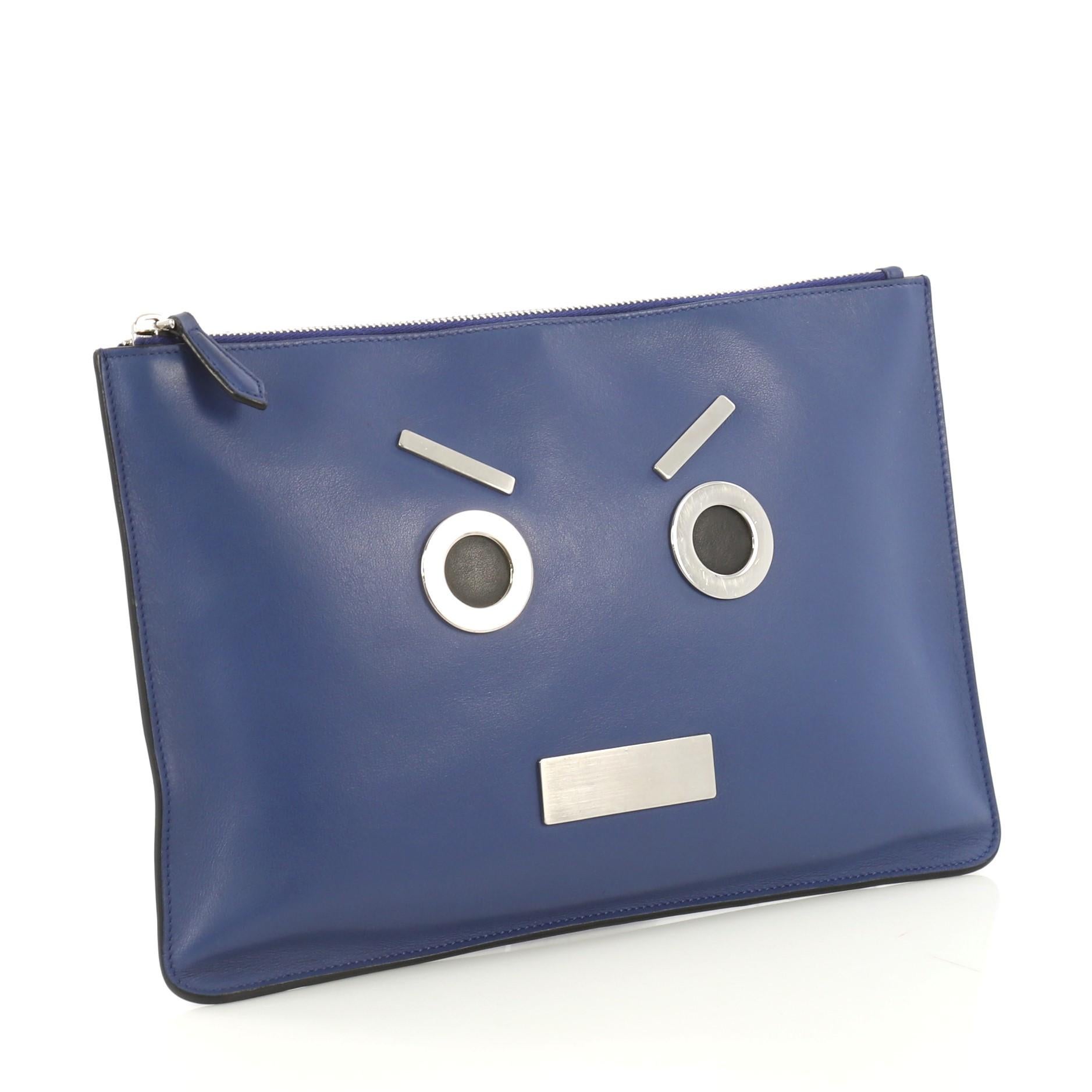 This Fendi Faces Pouch Leather Medium, crafted from blue leather, features 