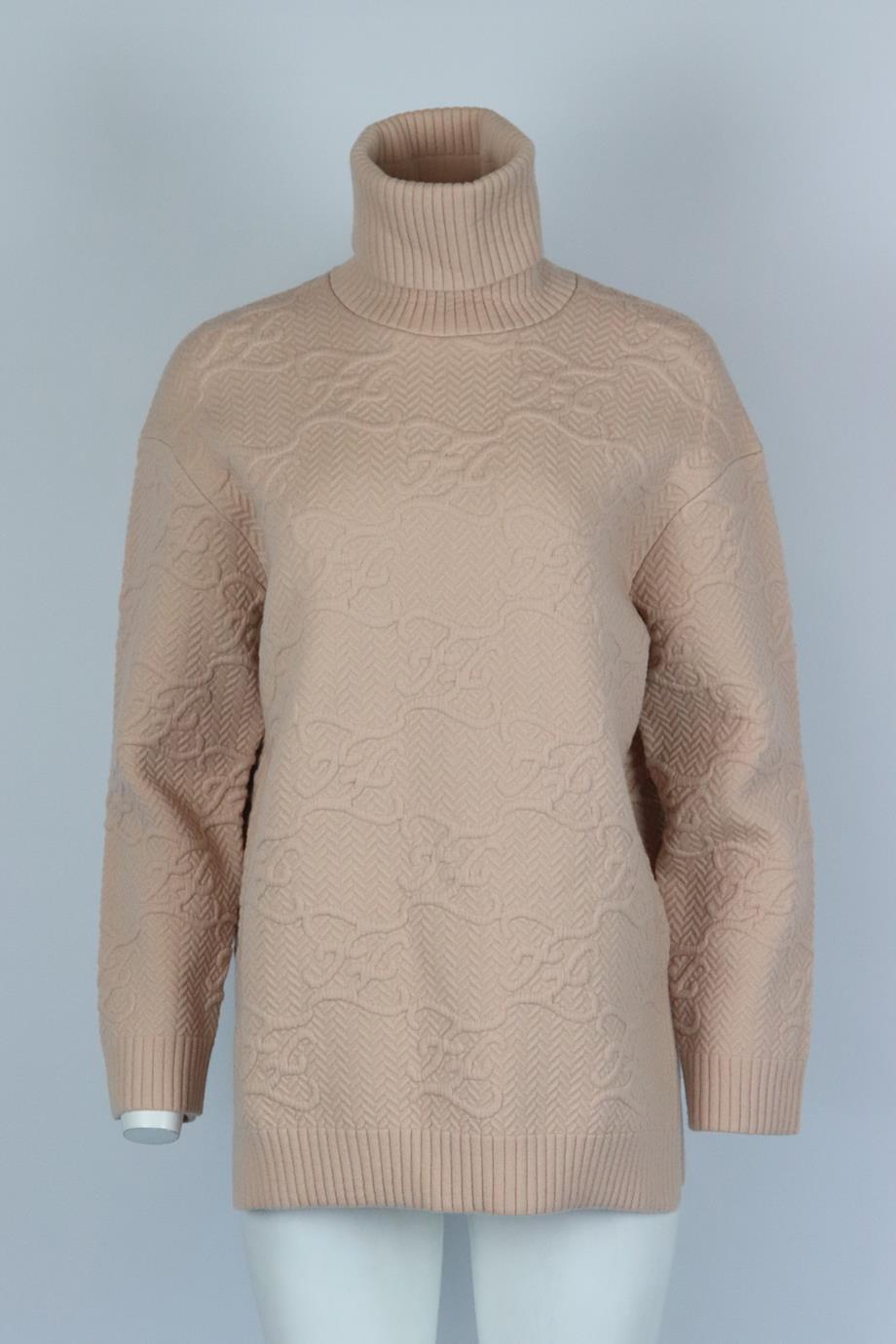 Fendi ff embossed knitted turtleneck sweater. Pink. Long sleeve, turtleneck. Slips on. 31% polyamide, 23% wool, 16% viscose, 14% polypropylene, 8% polyester, 5% cashmere, 3% elastane. Size: IT 38 (UK 6, US 2, FR 34). Bust: 44 in. Waist: 44 in. Hips: