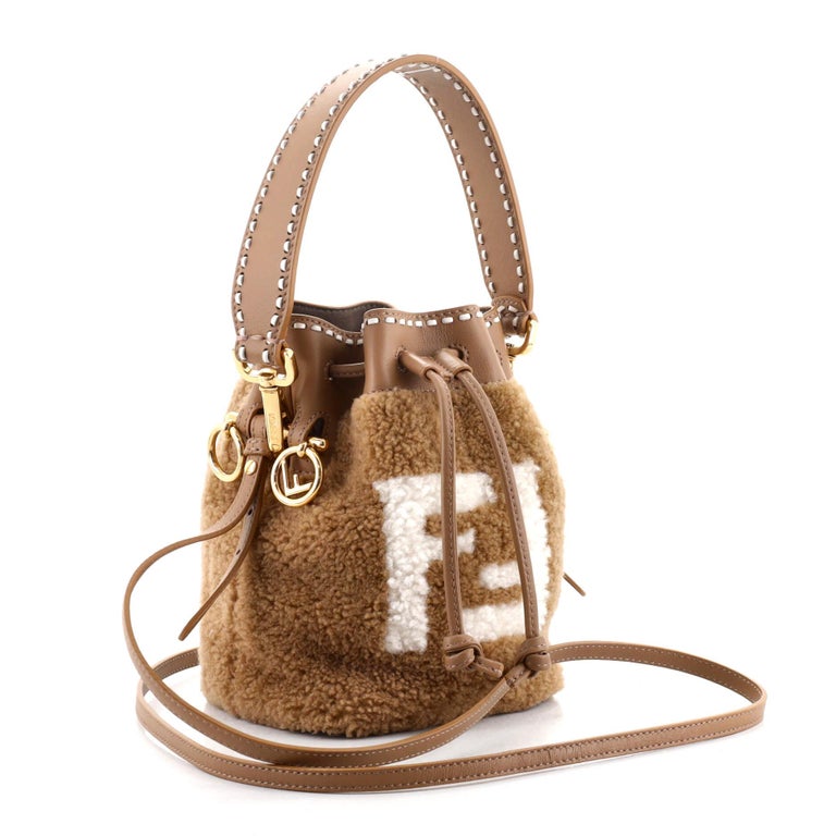 FENDI: Mon Tresor bucket bag in sheepskin with FF logo - Beige