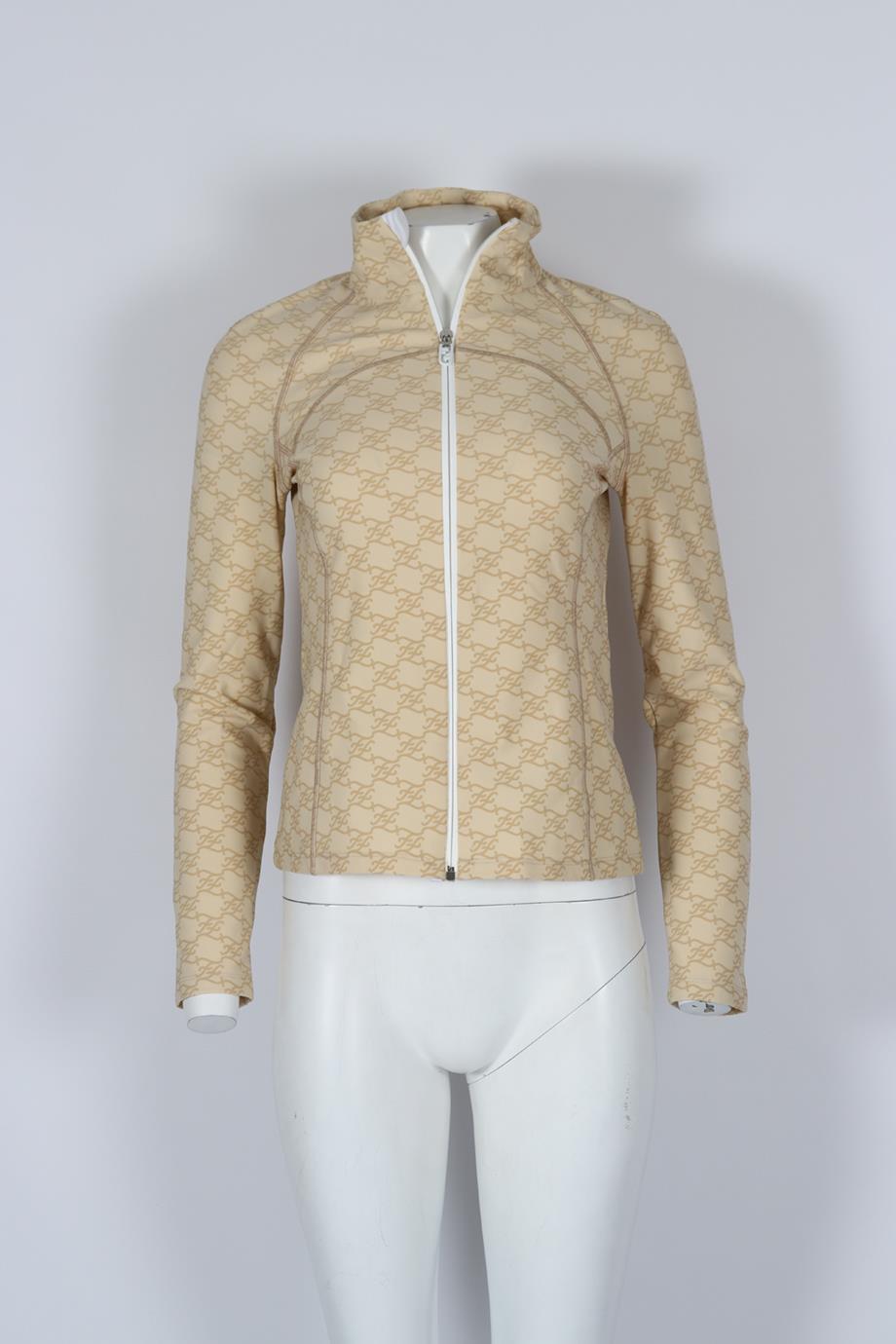 Fendi Ff Print Stretch Jersey Jacket. Beige and white. Long Sleeve. Turtleneck. Zip fastening - Front. 86% Polyester, 14% spandex. IT 42 (UK 10, US 6, FR 38). Bust: 33 in. Waist: 28.5 in. Hips: 36.2 in. Length: 23.1 in. Condition: Used. Very good