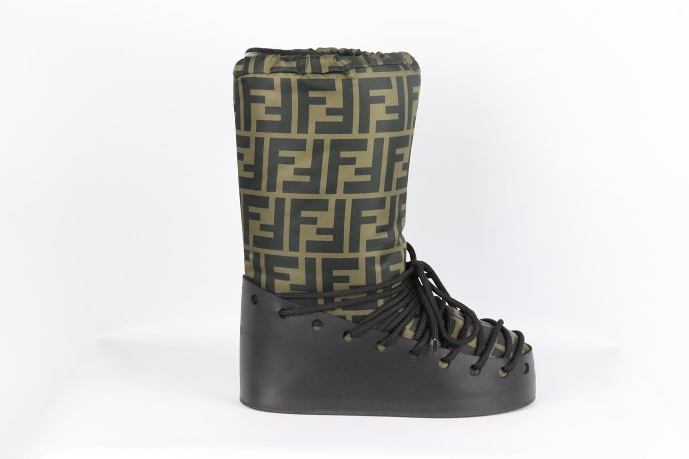 Fendi FF printed shell and leather snow boots. Brown and black. Pull on. Does not come with dustbag or box. Size: EU 38 (UK 5, US 6). Outersole: 11 in. Shaft: 10.1 in. Heel Height: 2.5 in. New without box