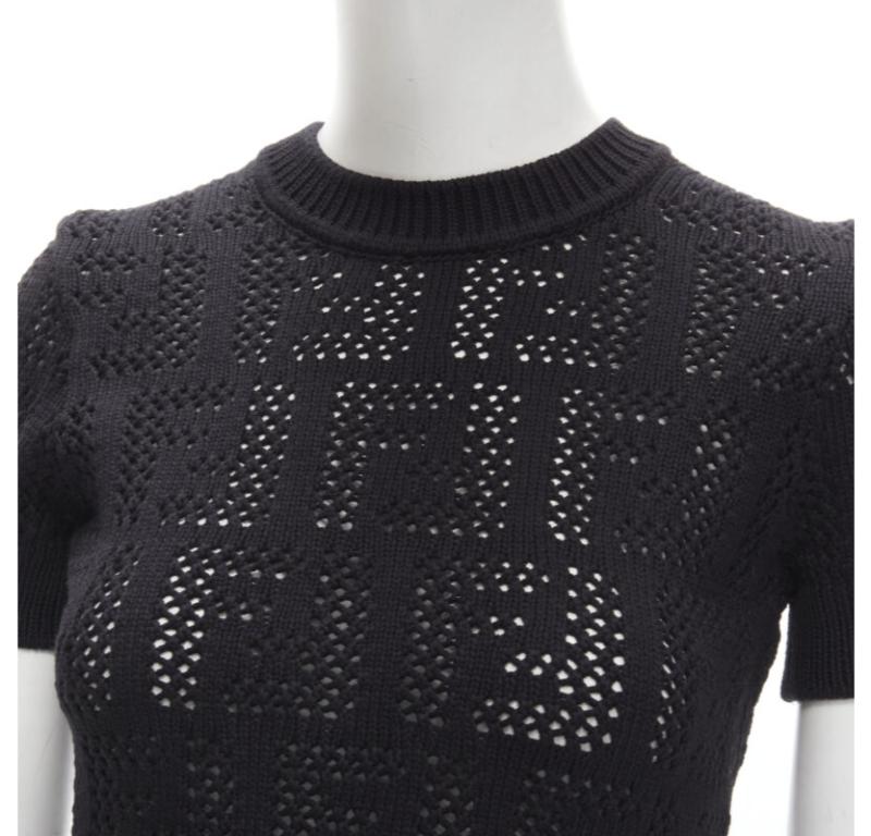 FENDI FF Zucca black cotton knit crochet sweater top IT36 XS
Reference: TGAS/C01372
Brand: Fendi
Designer: Kim Jones
Model: FZX641-AF4T-F0GME
Collection: FF Zucca
Material: Cotton, Polyamide
Color: Black
Pattern: Solid
Extra Details: FF Monogram