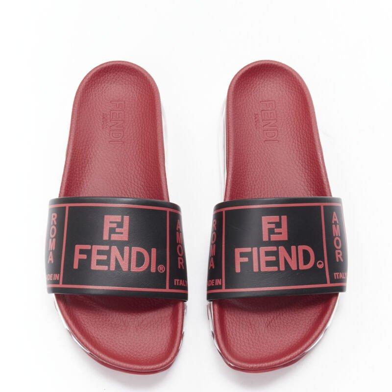 FENDI Fiend Roma Amor black red leather air sole slides sandals UK9 EU43
Reference: TGAS/B01607
Brand: Fendi
Model: Fiend slides
Material: Leather
Color: Red, Black
Pattern: Solid
Lining:  Leather
Extra Details: Fendi logo print. Leather strap.