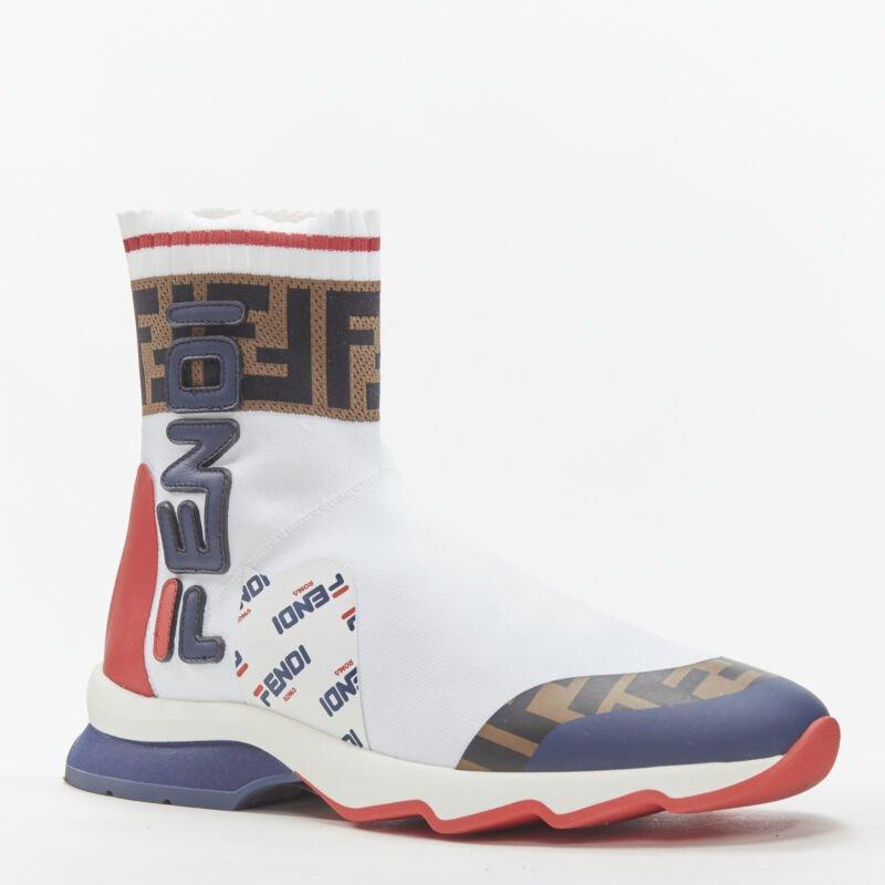 FENDI FILA Mania white logo lettering Zucca FF sock knit high top sneaker EU35
Reference: ANWU/A00386
Brand: Fendi
Material: Fabric
Color: White, Multicolour
Pattern: Logomania
Closure: Stretchy
Extra Details: Stretch fit. FENDI logo patchwork on