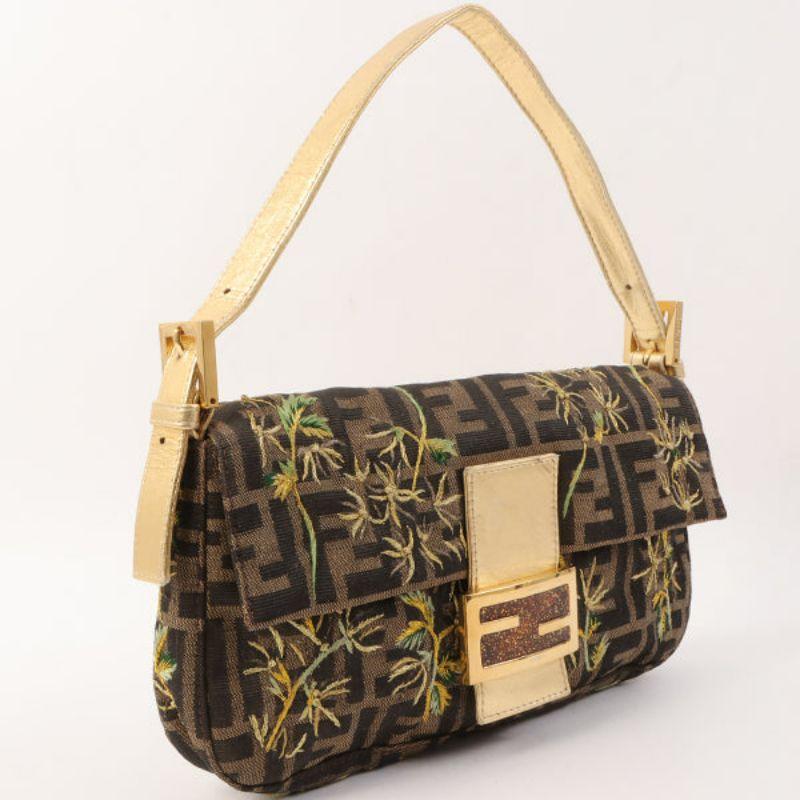 Fendi Flower Motif Ff Zucca Pattern Mama Baguette Brown/Gold/Multi

Additional information:
Measurements: 26 W x 4 D x 14 H cm 
Shoulder drop: 31-44 cm (3 adjustment holes)
Condition: Good
This item has been used and may have some minor flaws.