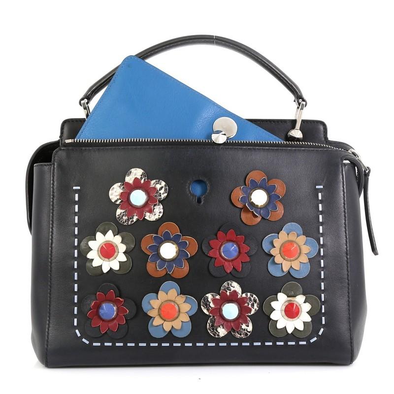 This Fendi Flowerland DotCom Convertible Satchel Embellished Leather Medium, crafted from blue leather, features a flat top handle, studded Flowerland flower appliqués, distinctive conical stud embellishment, and silver-tone hardware. Its extended