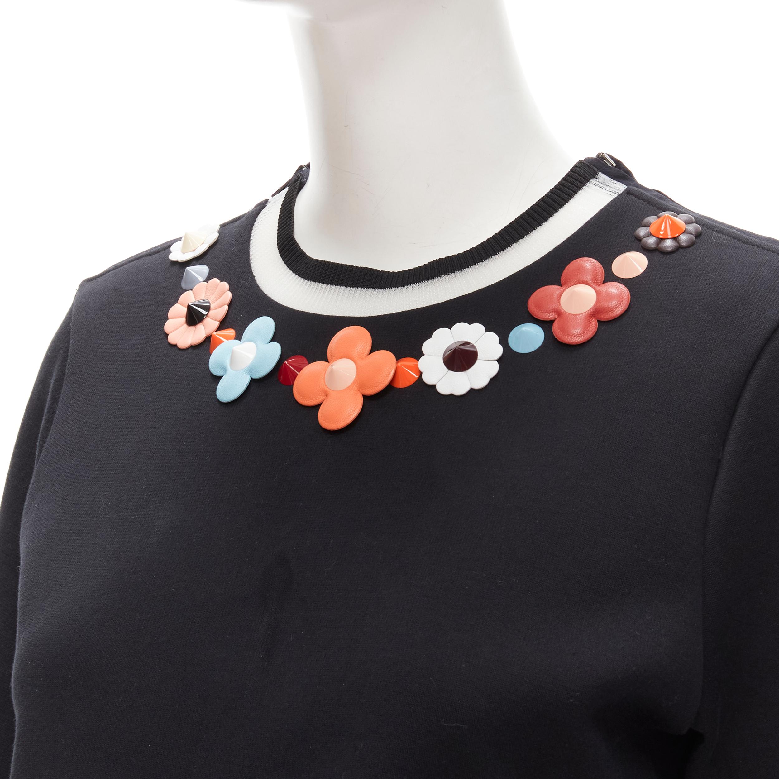 FENDI Flowerland leather spike stud mesh crew neck pullover sweater S
Brand: Fendi
Collection: Flowerland 
Material: Feels like cotton
Color: Black
Pattern: Solid
Closure: Zip
Extra Detail: Mesh insert at collar. Zip along shoulder seam. Floral