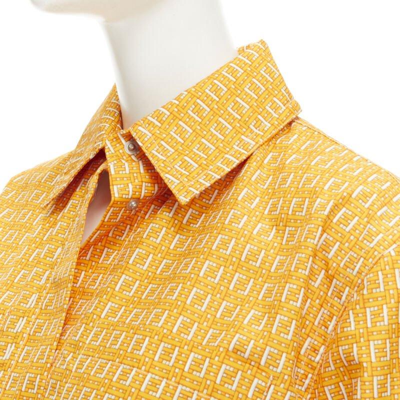 FENDI Forever Fendi woven FF Zucca logo print nylon windbreaker shirt IT40 S
Reference: TGAS/C00740
Brand: Fendi
Model: FAN028 AERW F12BV
Collection: Forever Fendi Bamboo
Material: Polyester
Color: Orange
Closure: Snap Buttons
Extra Details: Forever