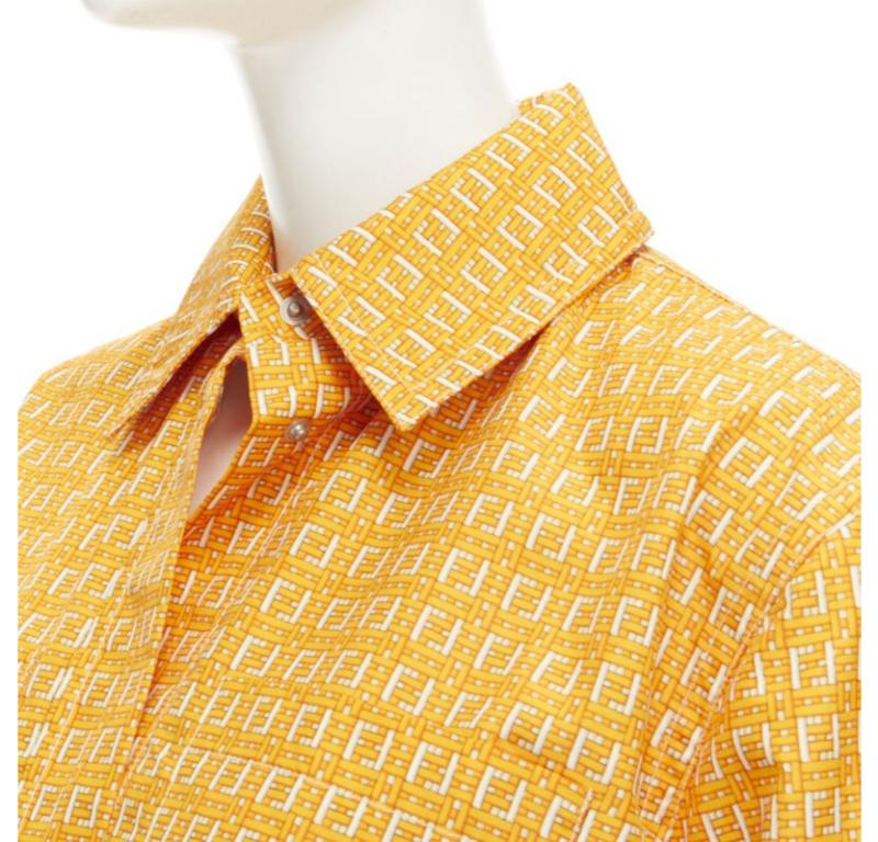 FENDI Forever Fendi woven FF Zucca logo print nylon windbreaker shirt IT40 S
Reference: TGAS/C00740
Brand: Fendi
Model: FAN028 AERW F12BV
Collection: Forever Fendi Bamboo
Material: Polyester
Color: Orange
Closure: Snap Buttons
Extra Details: Forever