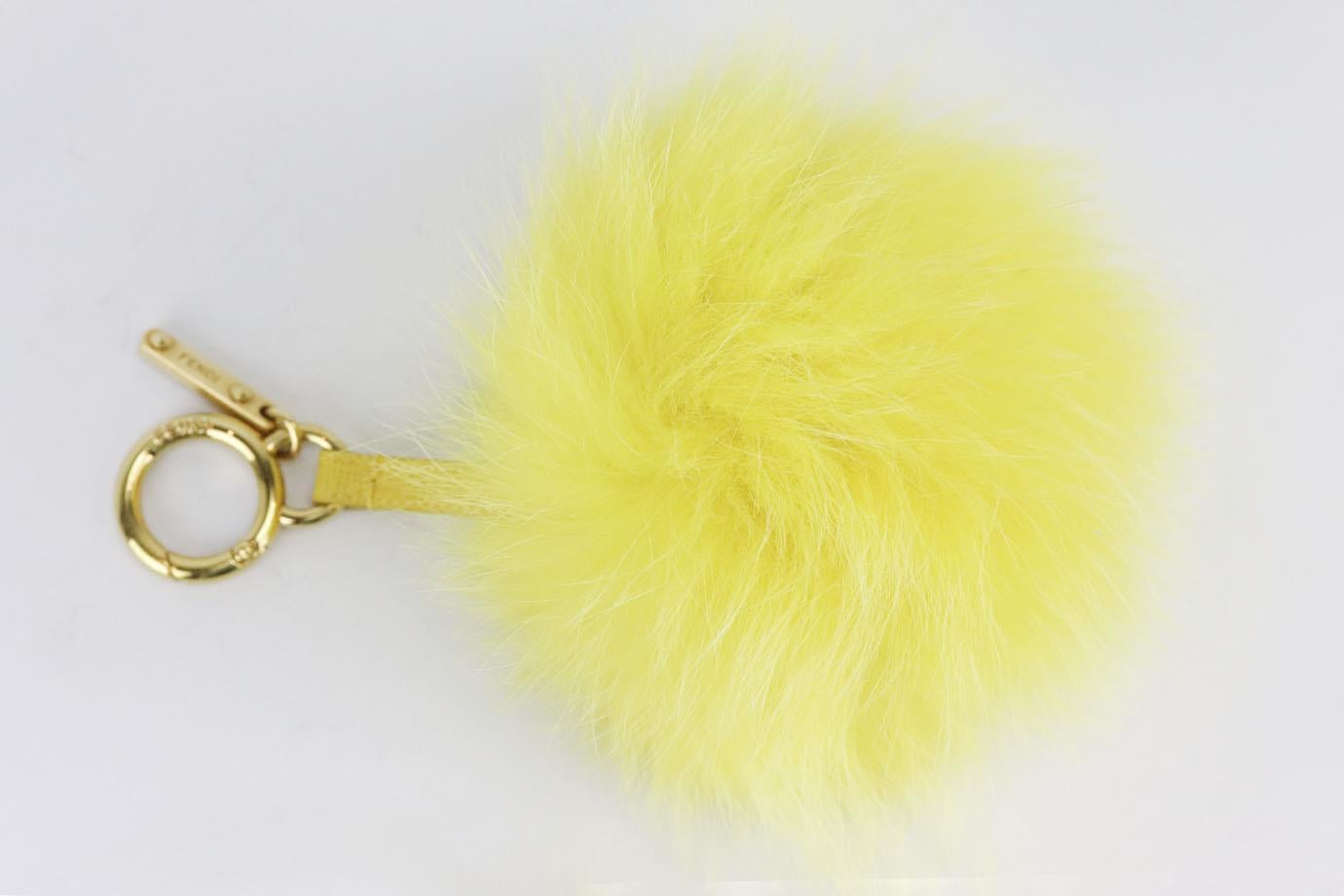 Fendi heart fox fur and leather bag charm. Red and pink. Lobster clasp fastening at top. Does not come with dustbag or box. Height: 9 in. Width: 5.5 in
