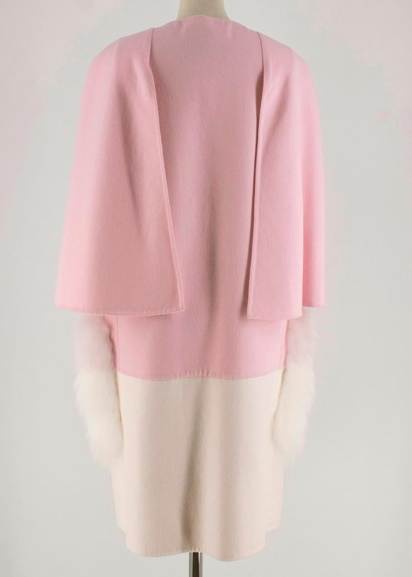 Fendi pastel pink and white cape coat featuring fur-trimmed pockets.

- Concealed front fastening
- Round neck
- Buttoned front
- 100% Wool
- Do not wash
- Made in Italy

Please note, these items are pre-owned and may show signs of being stored even