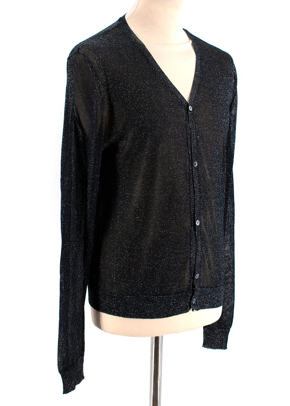 Men's Fendi Glittery Sheer Cardigan 48 EU

- Small metallic buttons
- Silvery sparkles blended into the fabric 
- Sheer finish
- V-neckline
- Ribbed hemlines & Cuffs 
- Raw edges
- 48 = Medium

Fabric Composition:
80% Rayon
20% Polyester

Made in