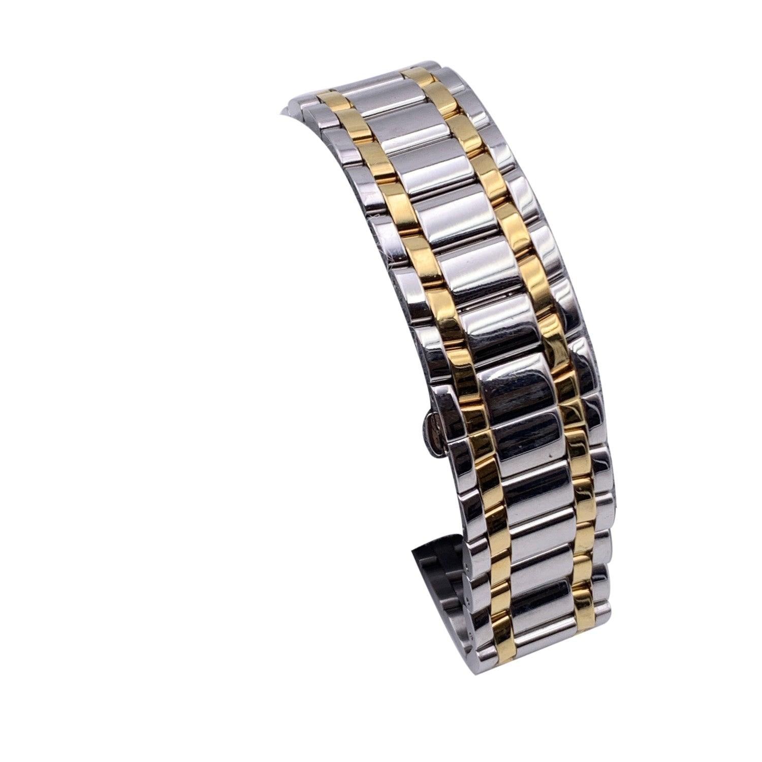 Fendi gold-tone and silver-tone stainless steel watch, Mod. 7000 G. Rectangle stainless steel case. Gold dial with numbers and two hands. Sapphire crystal. Swiss Made Quartz movement. Second dial at 6 o' clock. Fendi written on face. Gold-tone and